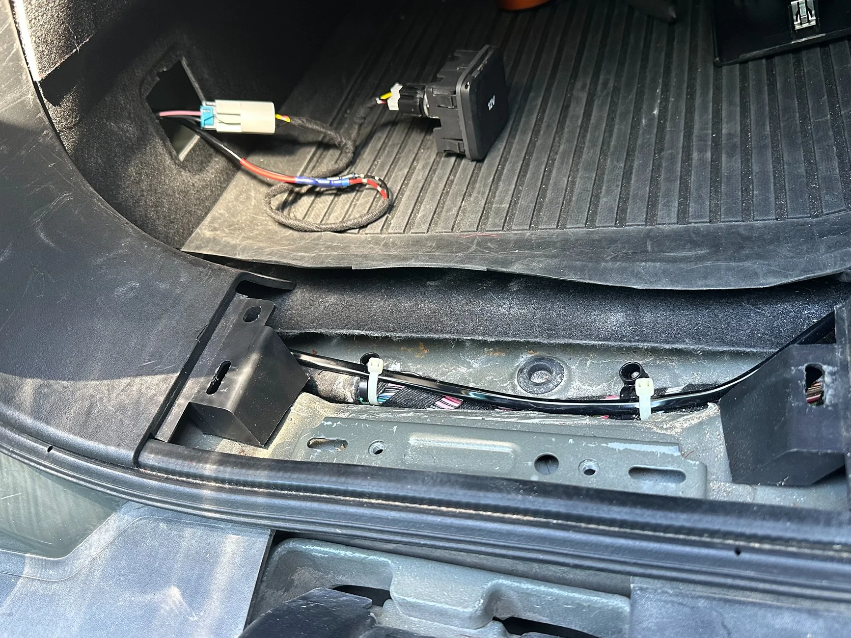 Rivian R1T R1S Added 12v outlet to R1T bed. IMG_3391