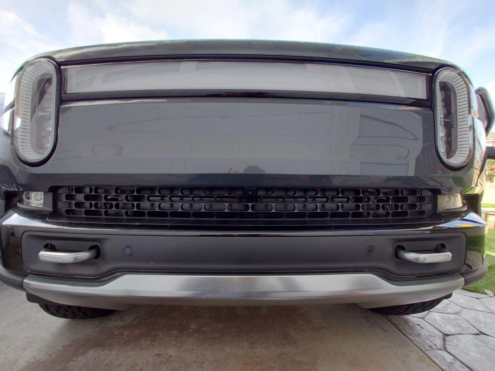 Rivian R1T R1S What's this opening behind the grille? 89d1b482-22a1-4ab9-8b24-430263950753