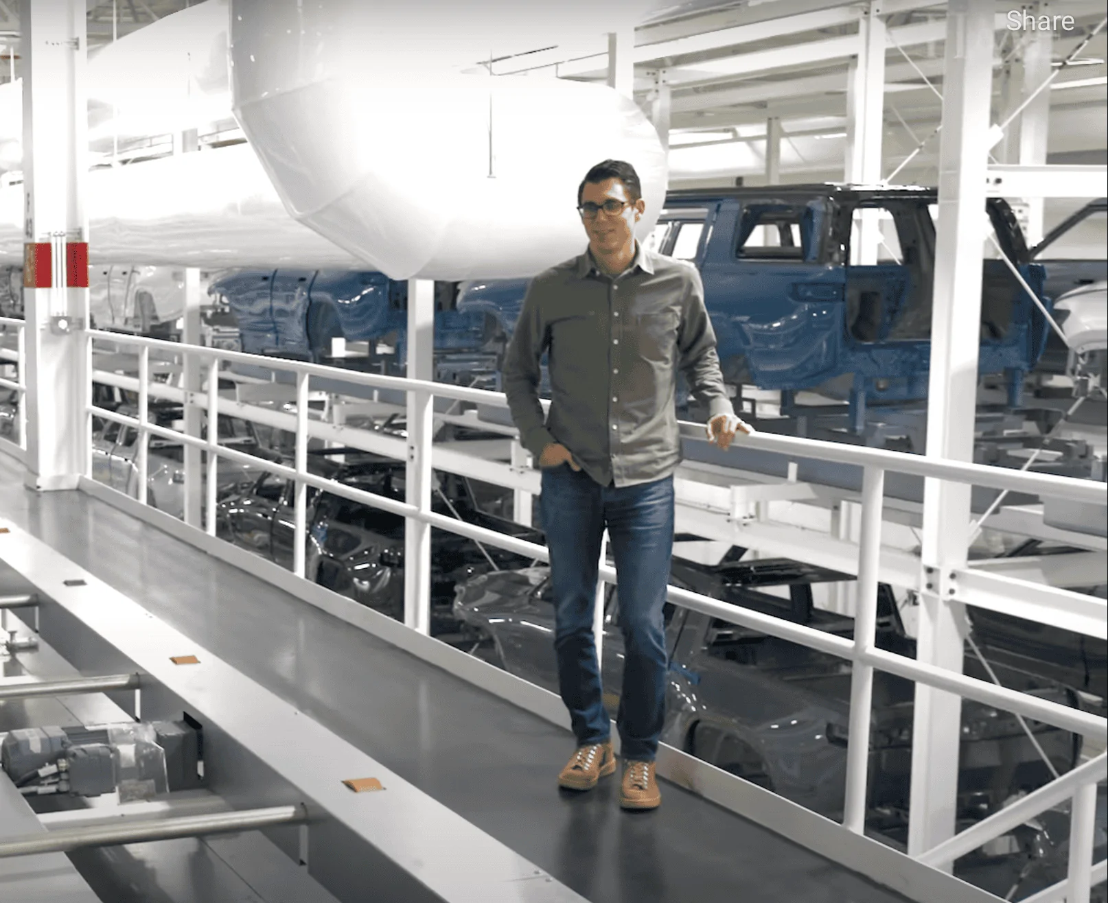 Rivian R1T R1S R1S’s seen on the line in the Time100 video 1648770204123