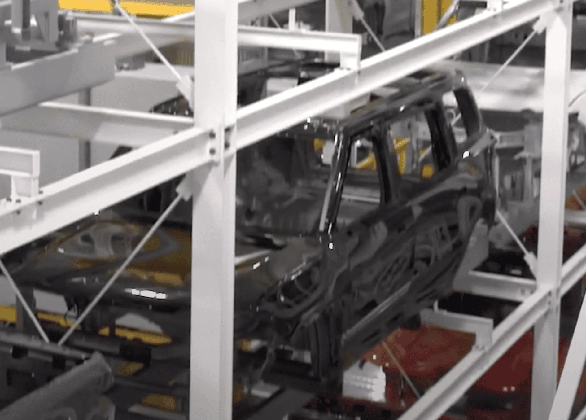 Rivian R1T R1S R1S’s seen on the line in the Time100 video 1648828725589