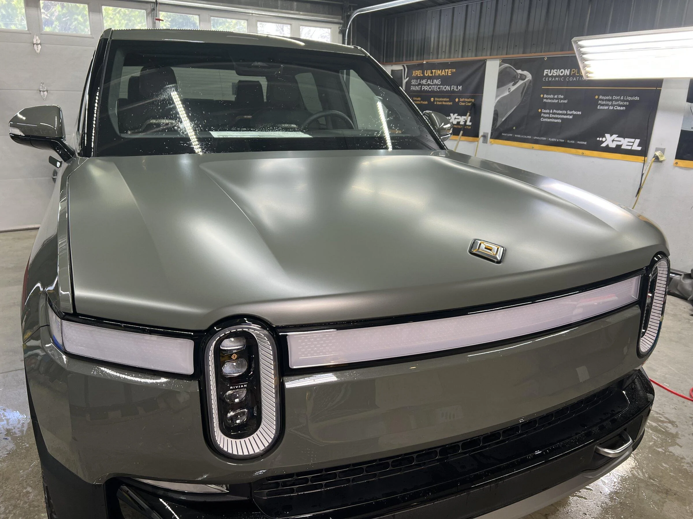 Rivian R1T R1S Sneak peek Xpel Stealth PPF Wrapped Launch Green R1T 902B4DFB-99F7-427D-A8FE-05E9A1CB26CE