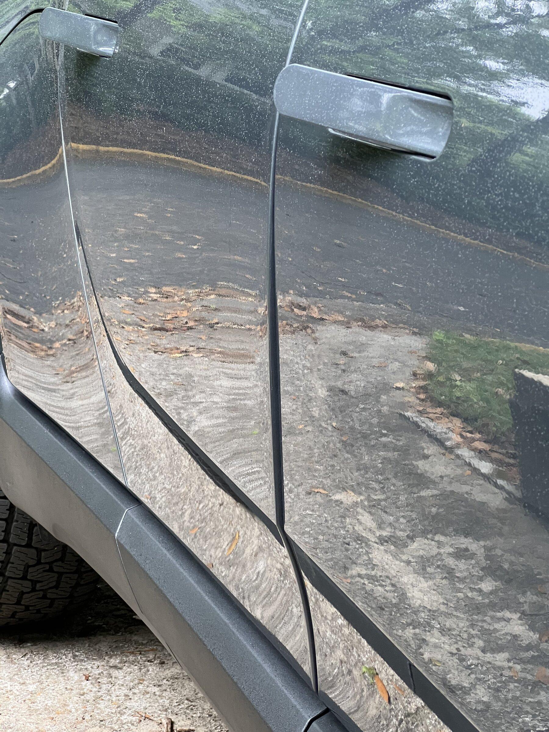 Rivian R1T R1S one door is pretty horribly formed among other issues (still love the truck overall, though) IMG_5393