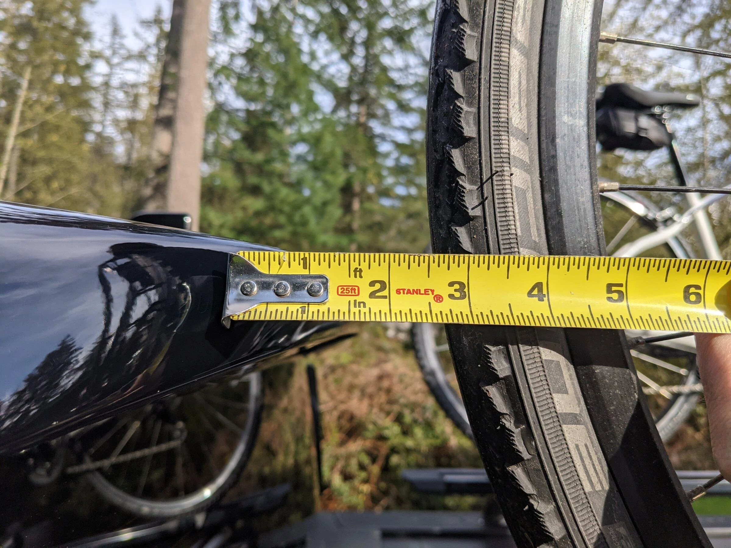 Rivian R1T R1S R1T over-bed bikes on Yakima HighRoad Bike Mount PXL_20220415_000227681
