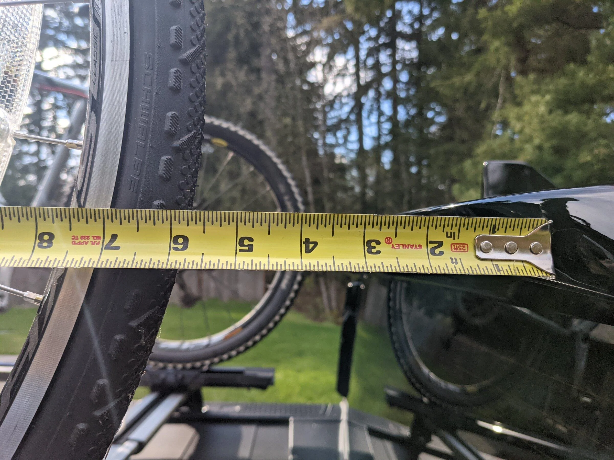 Rivian R1T R1S R1T over-bed bikes on Yakima HighRoad Bike Mount PXL_20220415_000703559