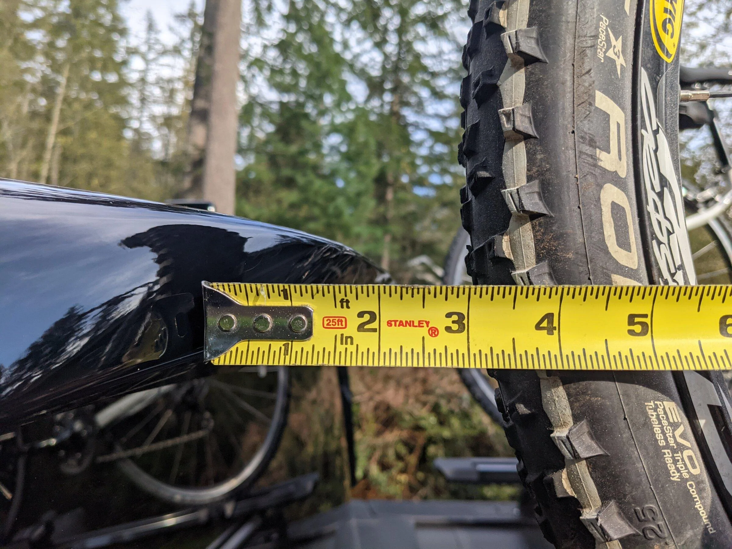 Rivian R1T R1S R1T over-bed bikes on Yakima HighRoad Bike Mount PXL_20220415_000622726