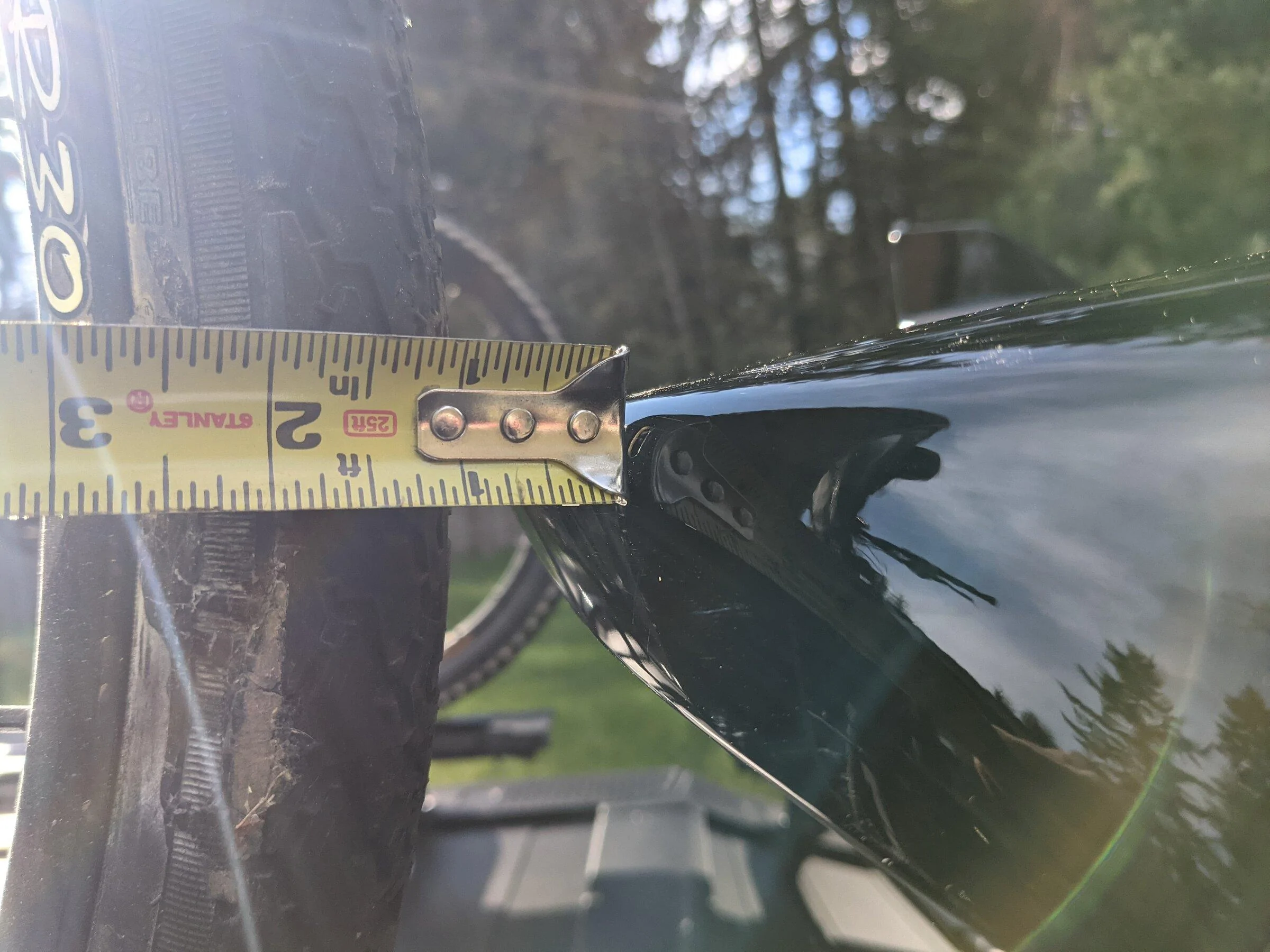 Rivian R1T R1S R1T over-bed bikes on Yakima HighRoad Bike Mount PXL_20220415_001357369