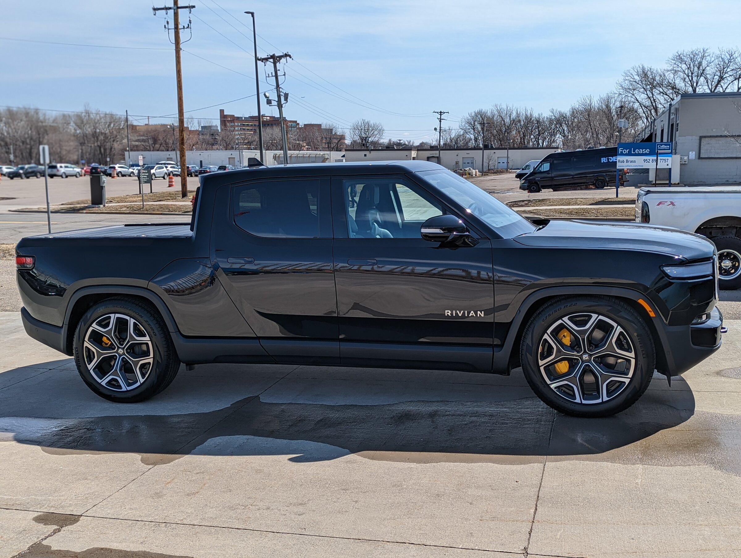 Rivian R1T R1S Midnight Black R1T on Black Wheels @ High and Lowest Suspension Settings PXL_20220401_183244604.PORTRAIT