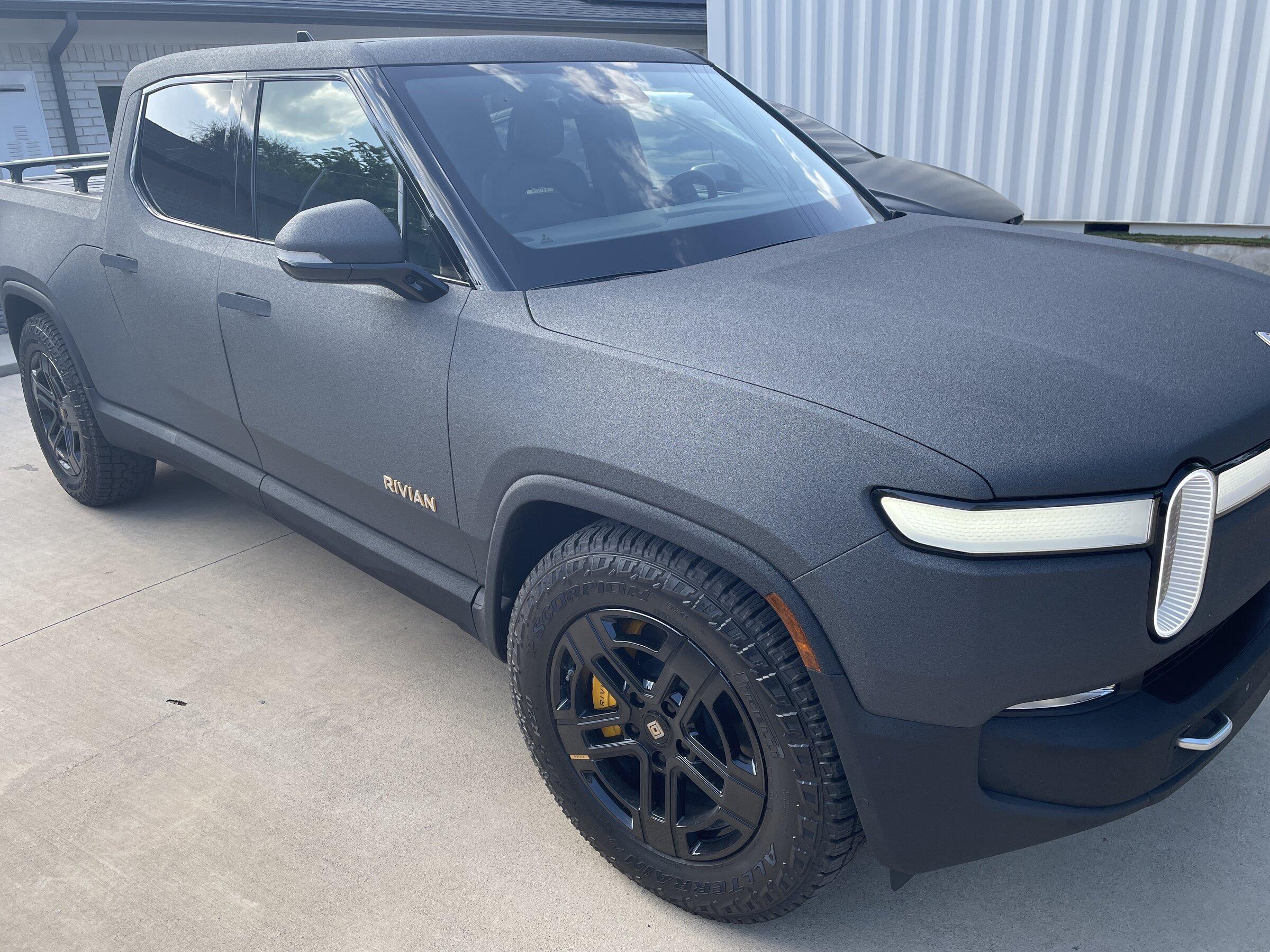 Rivian R1T R1S Raptor bedliner sprayed R1T image