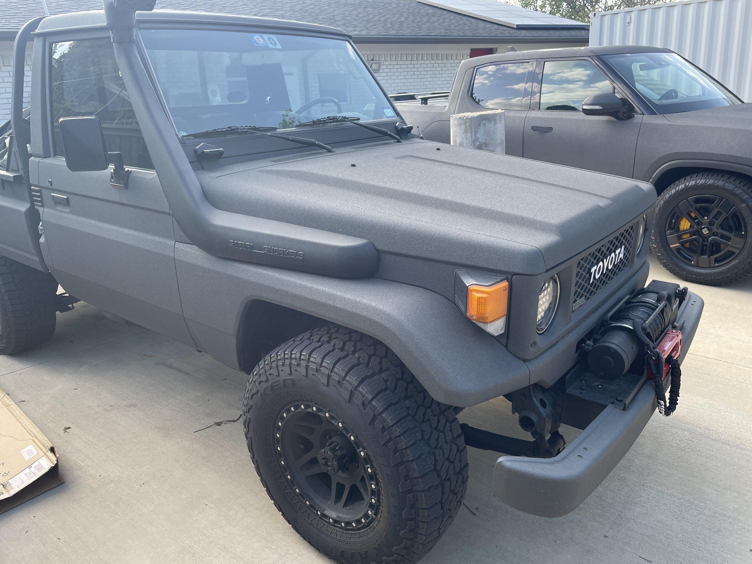 Rivian R1T R1S Raptor bedliner sprayed R1T image
