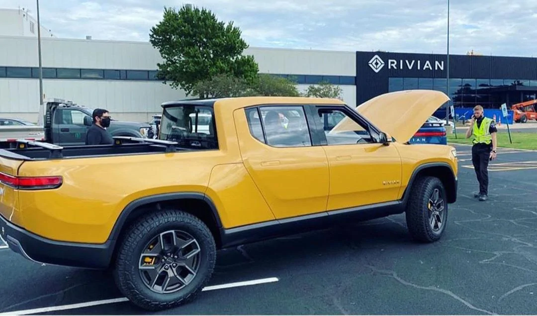 Rivian R1T R1S Real Rivian Photos & Videos Yellow-R1T-pickup-normal-polic