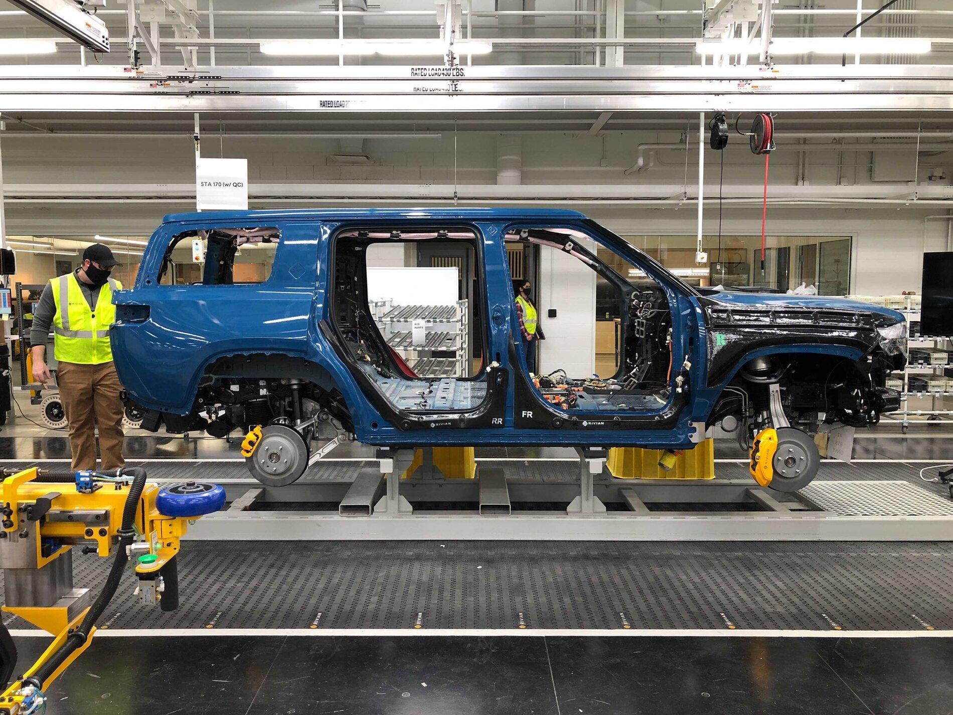 Rivian R1T R1S R1S spotted on the Assembly line Rivian R1S on production line