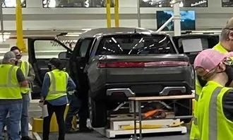 Rivian R1T R1S "Launch Green" paint stand-ins LG