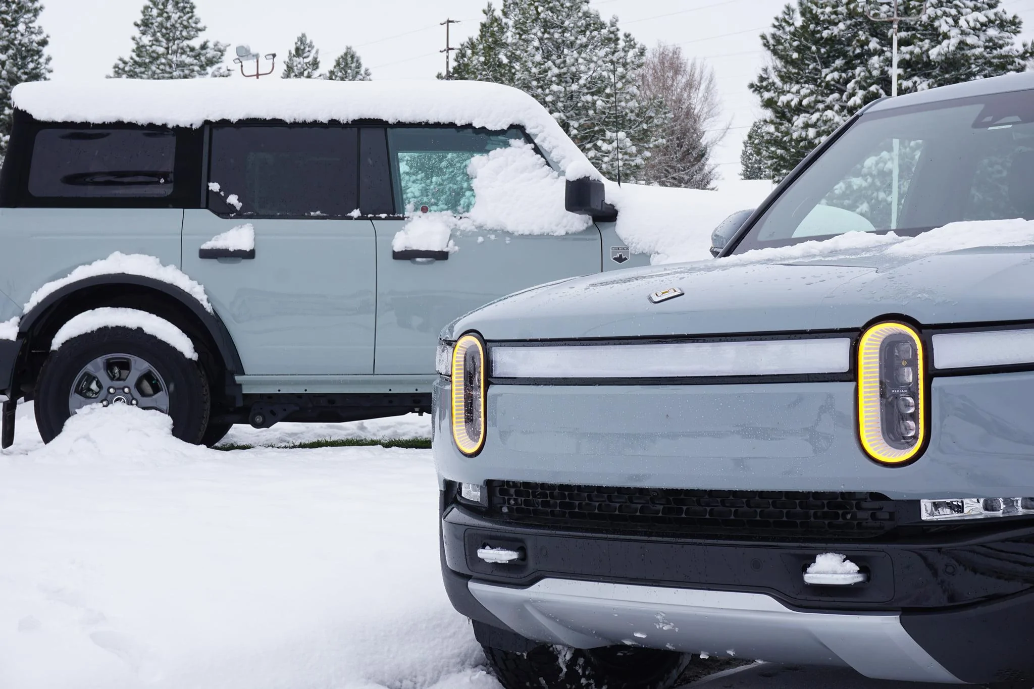 Rivian R1T R1S LIMESTONE R1T Photos Limestone Rivian R1T vs Cactus Gray Bronco 2