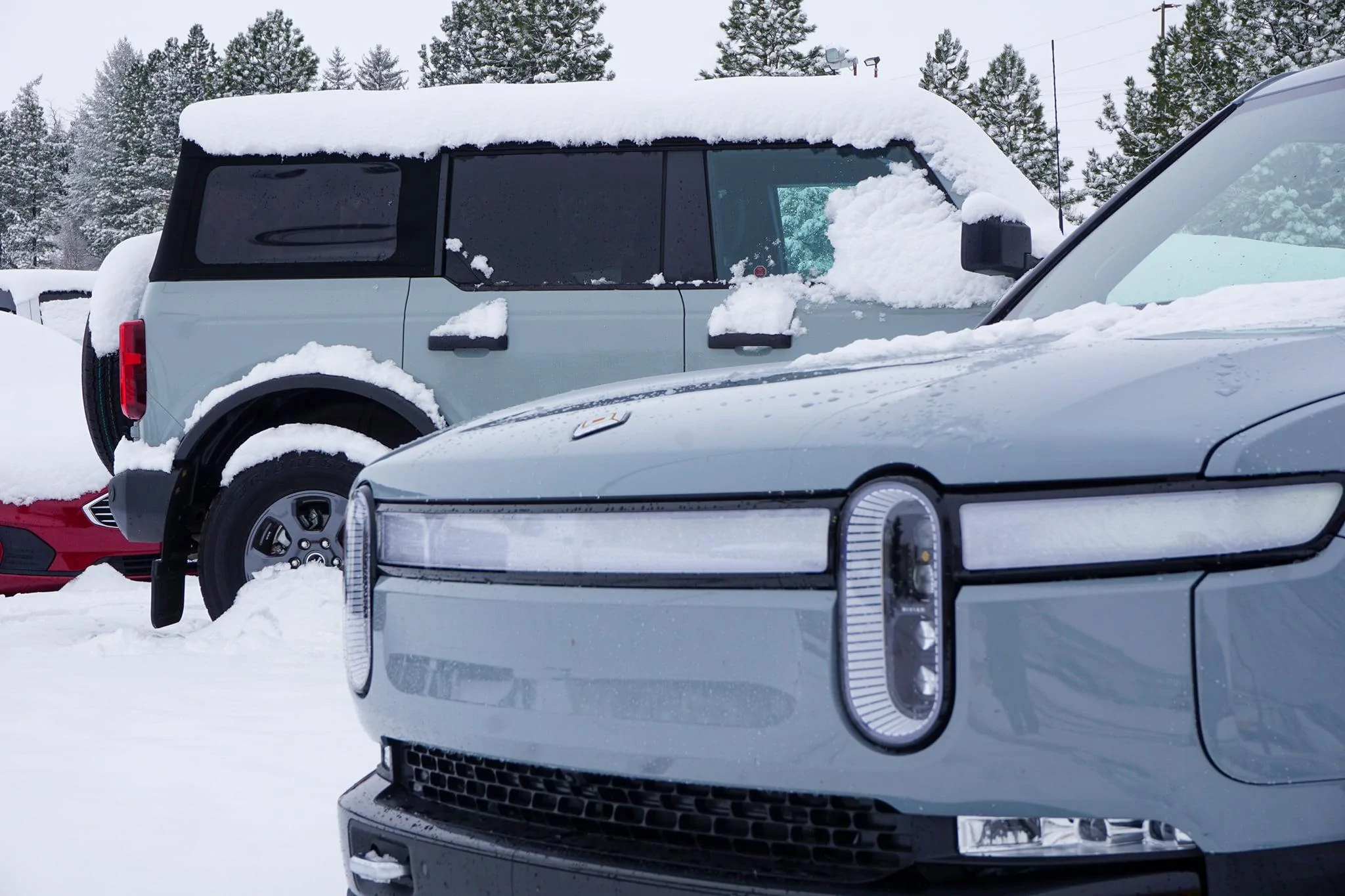 Rivian R1T R1S LIMESTONE R1T Photos Limestone Rivian R1T vs Cactus Gray Bronco 3