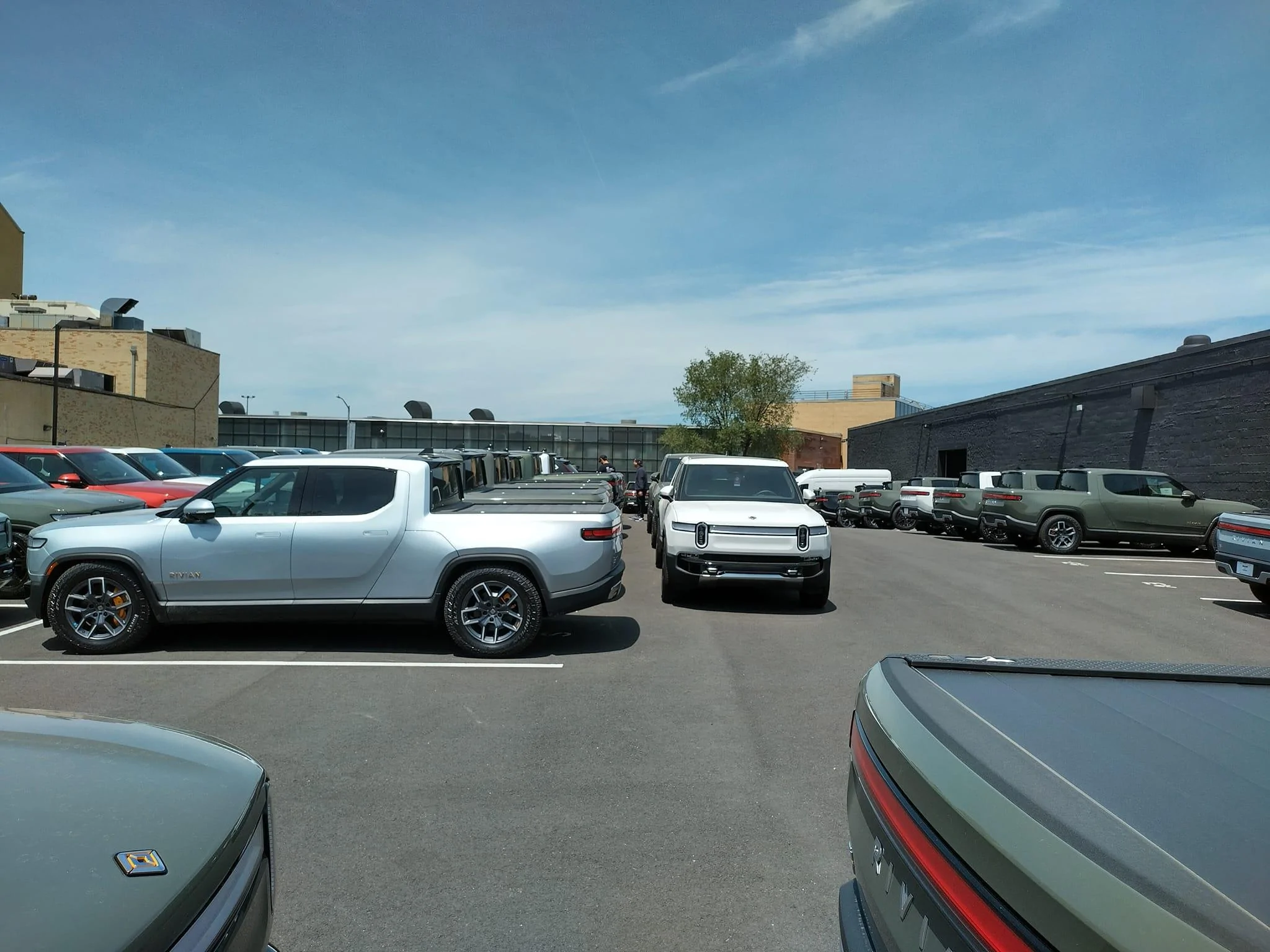 Rivian R1T R1S Current look at Brooklyn Rivian Service Center's parking lot full of R1T Brooklyn Rivian Service Center's parking lot full of R1T4