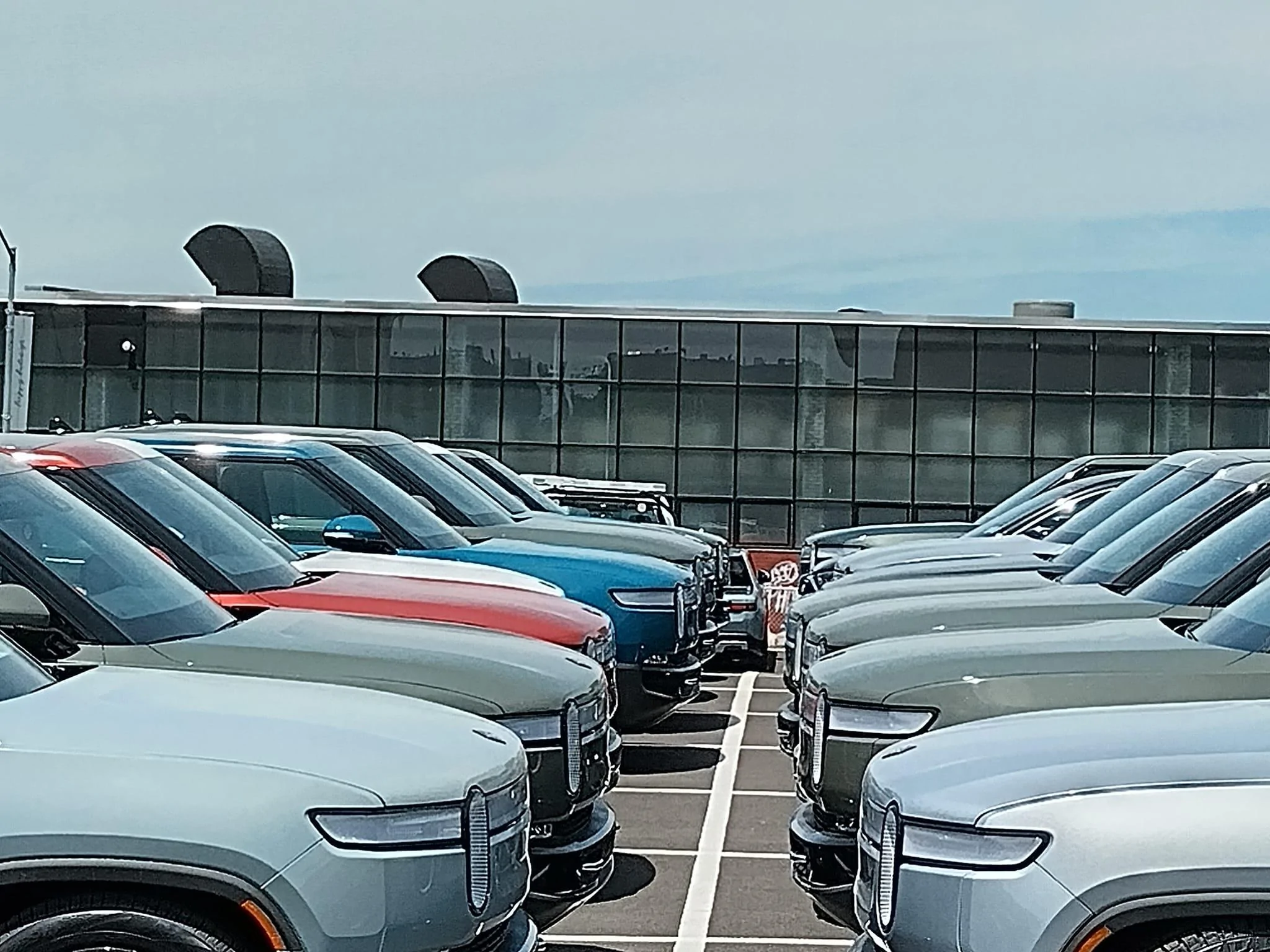 Rivian R1T R1S Current look at Brooklyn Rivian Service Center's parking lot full of R1T Brooklyn Rivian Service Center's parking lot full of R1T6