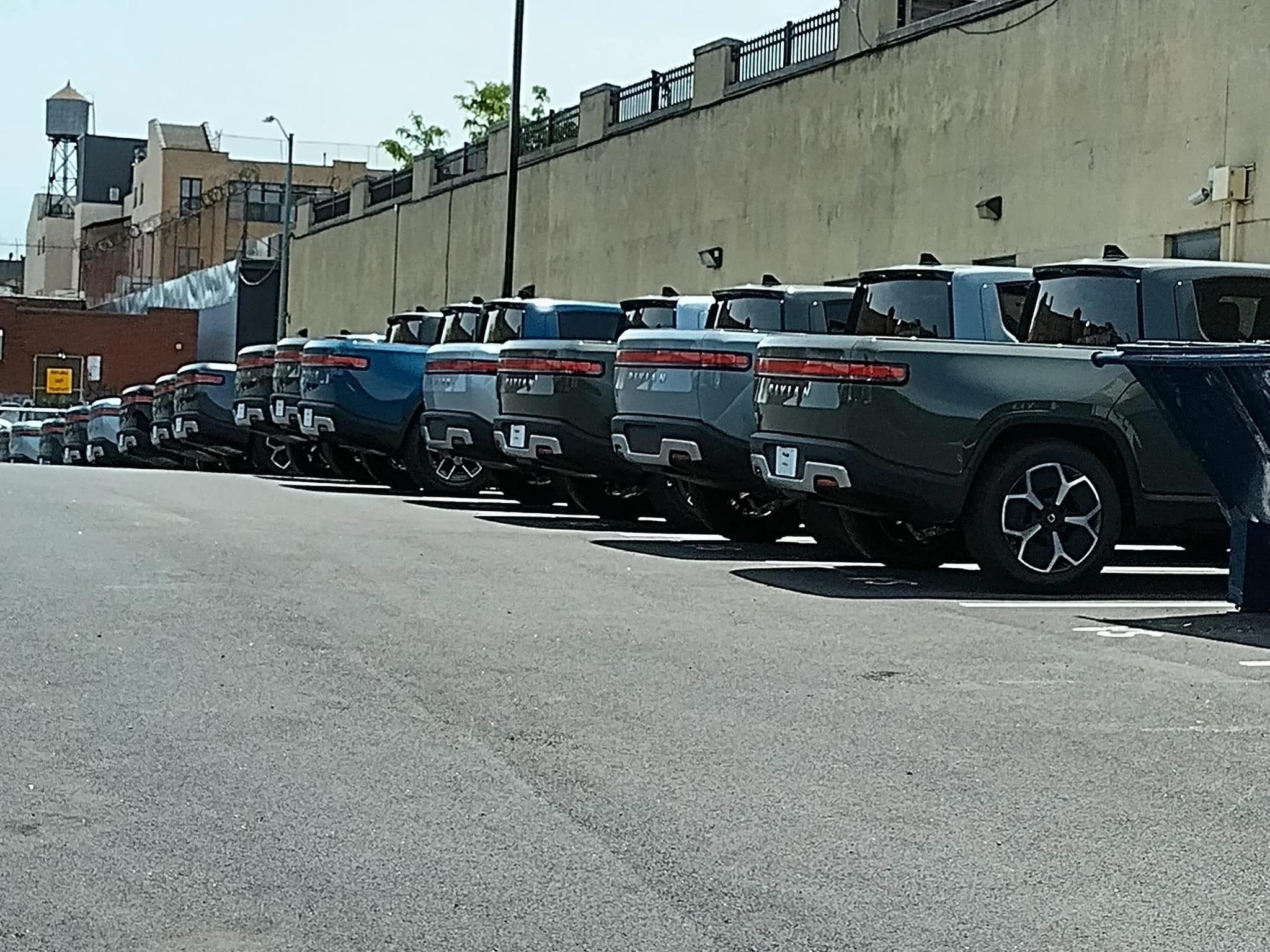 Rivian R1T R1S Current look at Brooklyn Rivian Service Center's parking lot full of R1T Brooklyn Rivian Service Center's parking lot full of R1T5