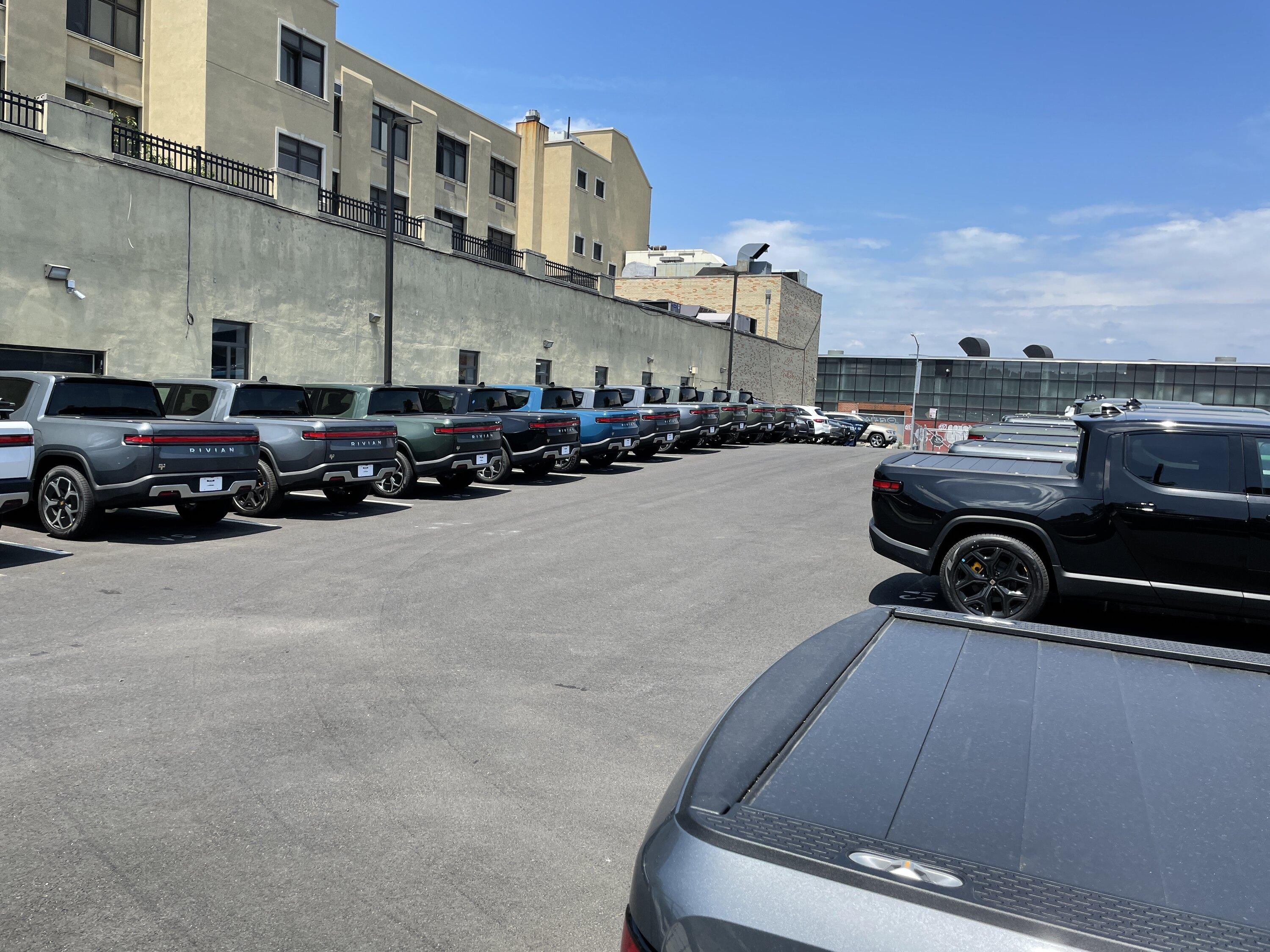 Rivian R1T R1S Current look at Brooklyn Rivian Service Center's parking lot full of R1T 5DE2377A-17E8-46EF-ADAF-FF9B9389014C