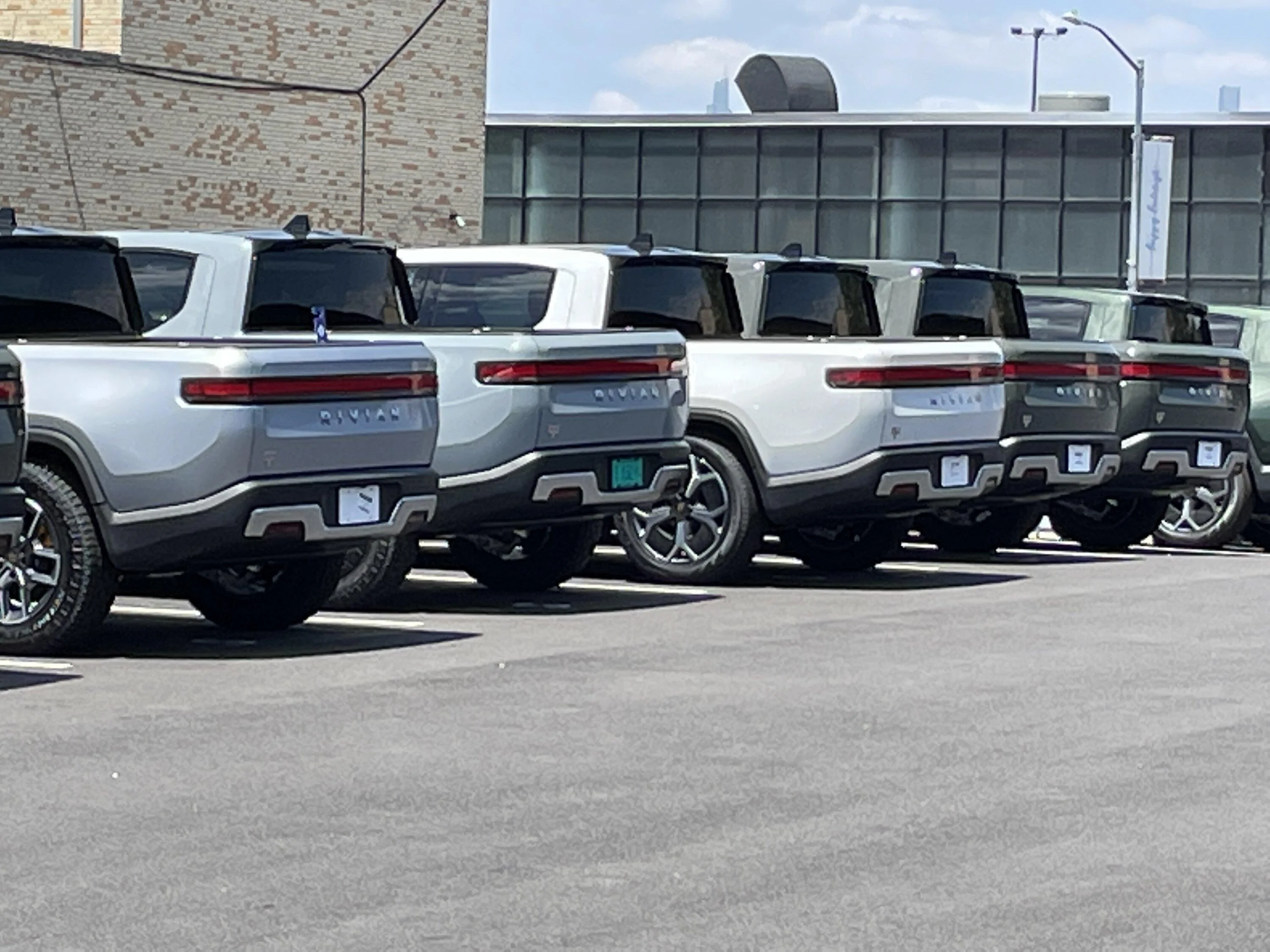 Rivian R1T R1S Current look at Brooklyn Rivian Service Center's parking lot full of R1T 25FE3D3D-5D61-413C-A3D2-09F21BFDFE38
