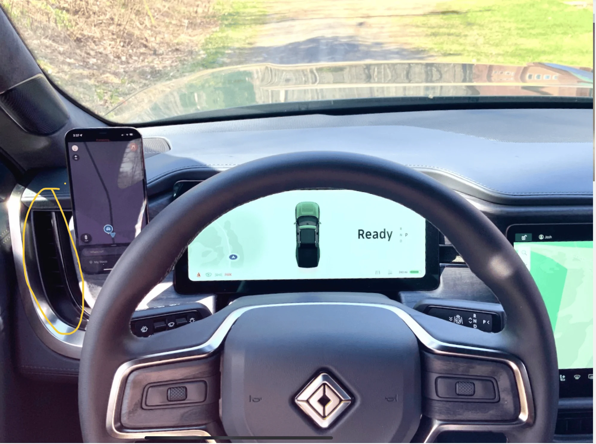 Rivian R1T R1S Mounting a cell phone.  Has anyone done it? 1654025558667