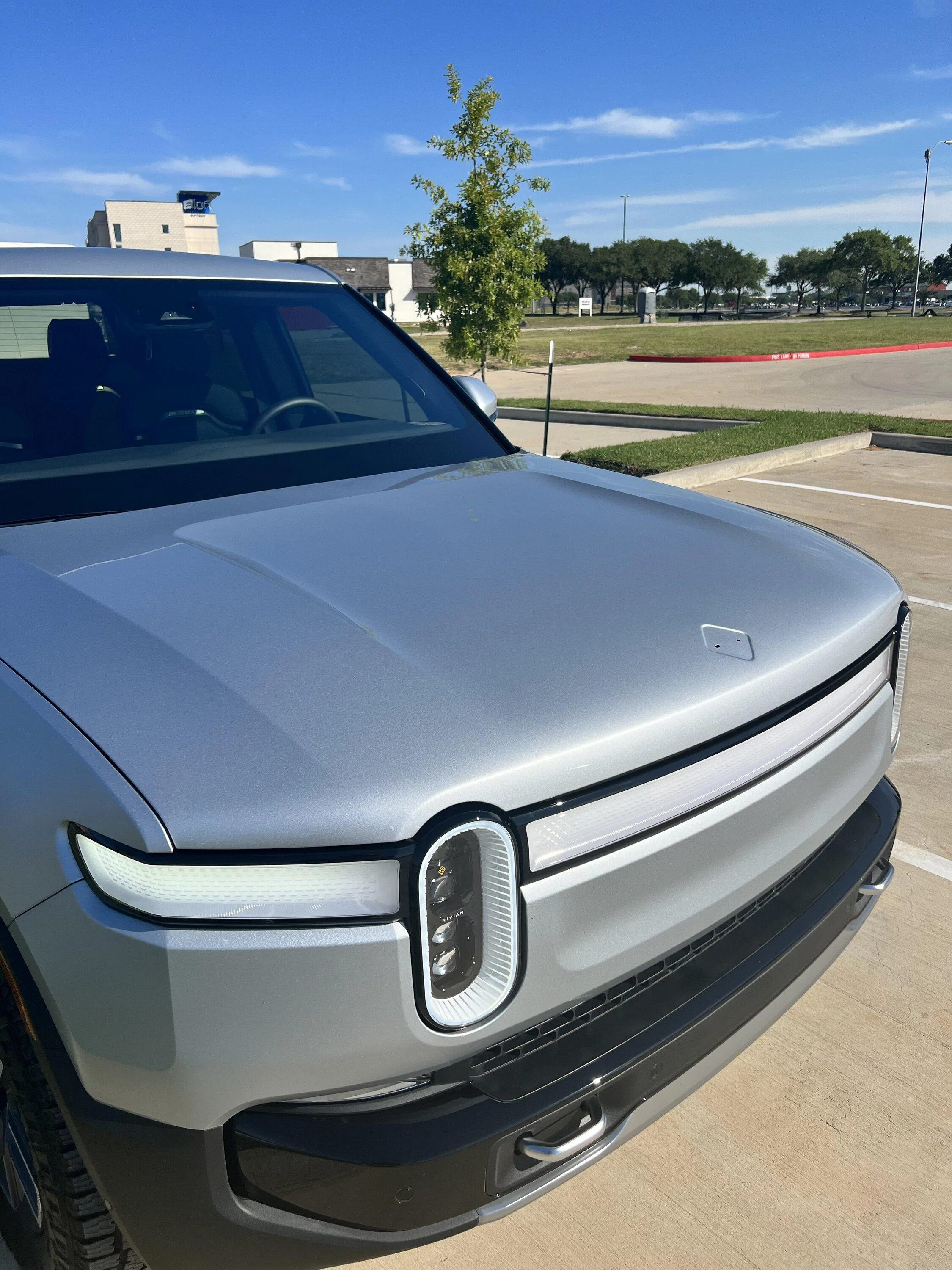Rivian R1T R1S No More Tiger Stripes on Paint -- fixed by Rivian Service along with Rivian also rear window replacement IMG_6237