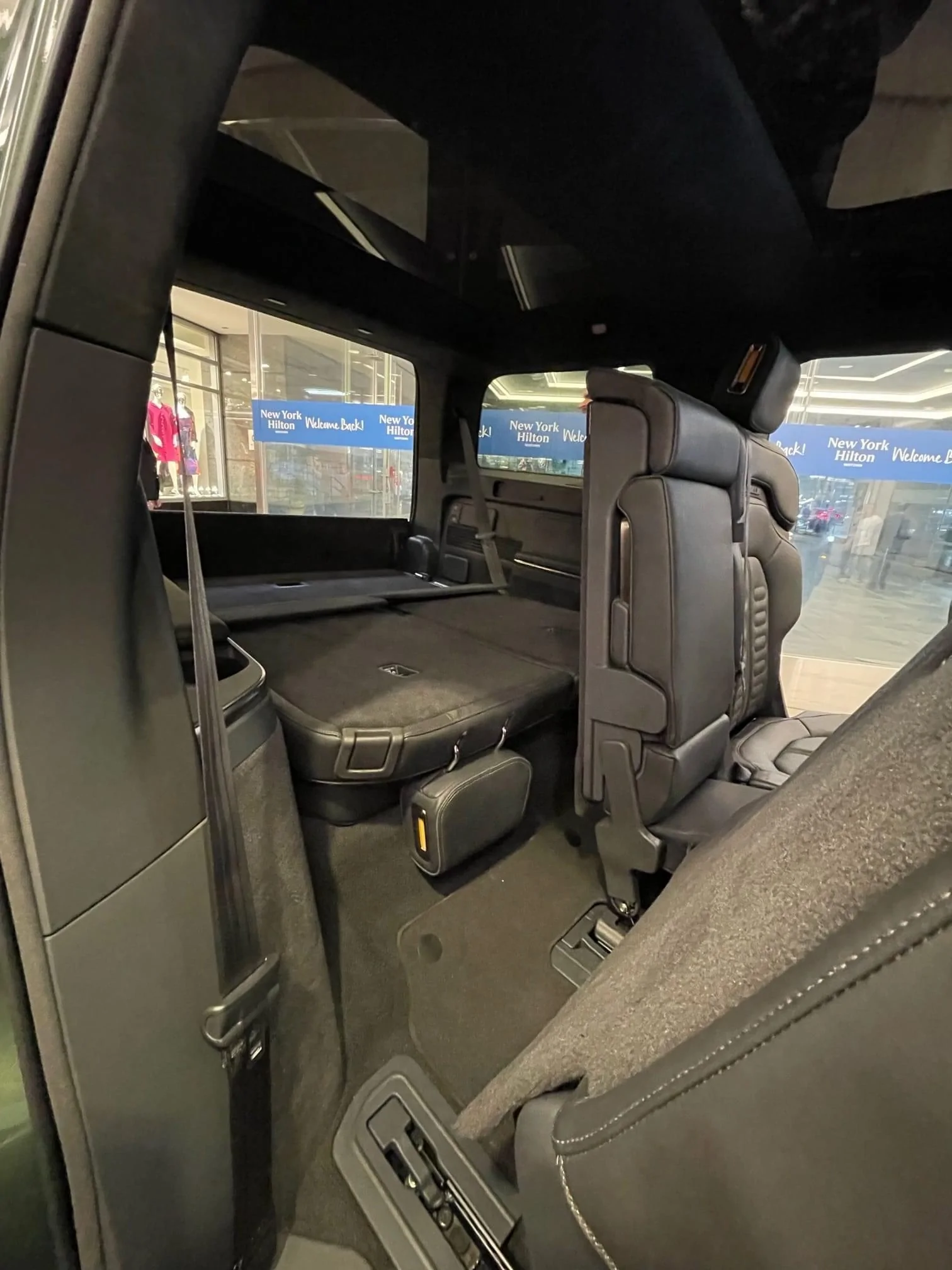 Rivian R1T R1S ? FOREST GREEN R1S Photos Rivian R1S 2nd row 3rd row seats legroom 2