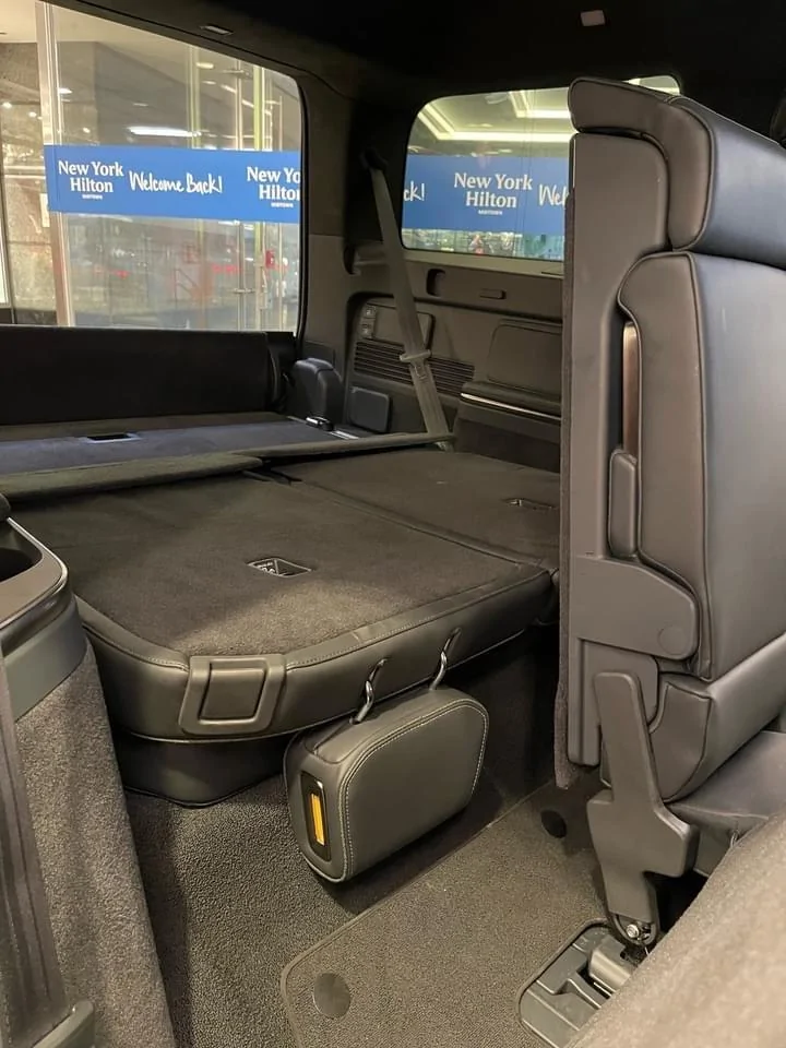Rivian R1T R1S ? FOREST GREEN R1S Photos Rivian R1S 2nd row 3rd row seats legroom 1