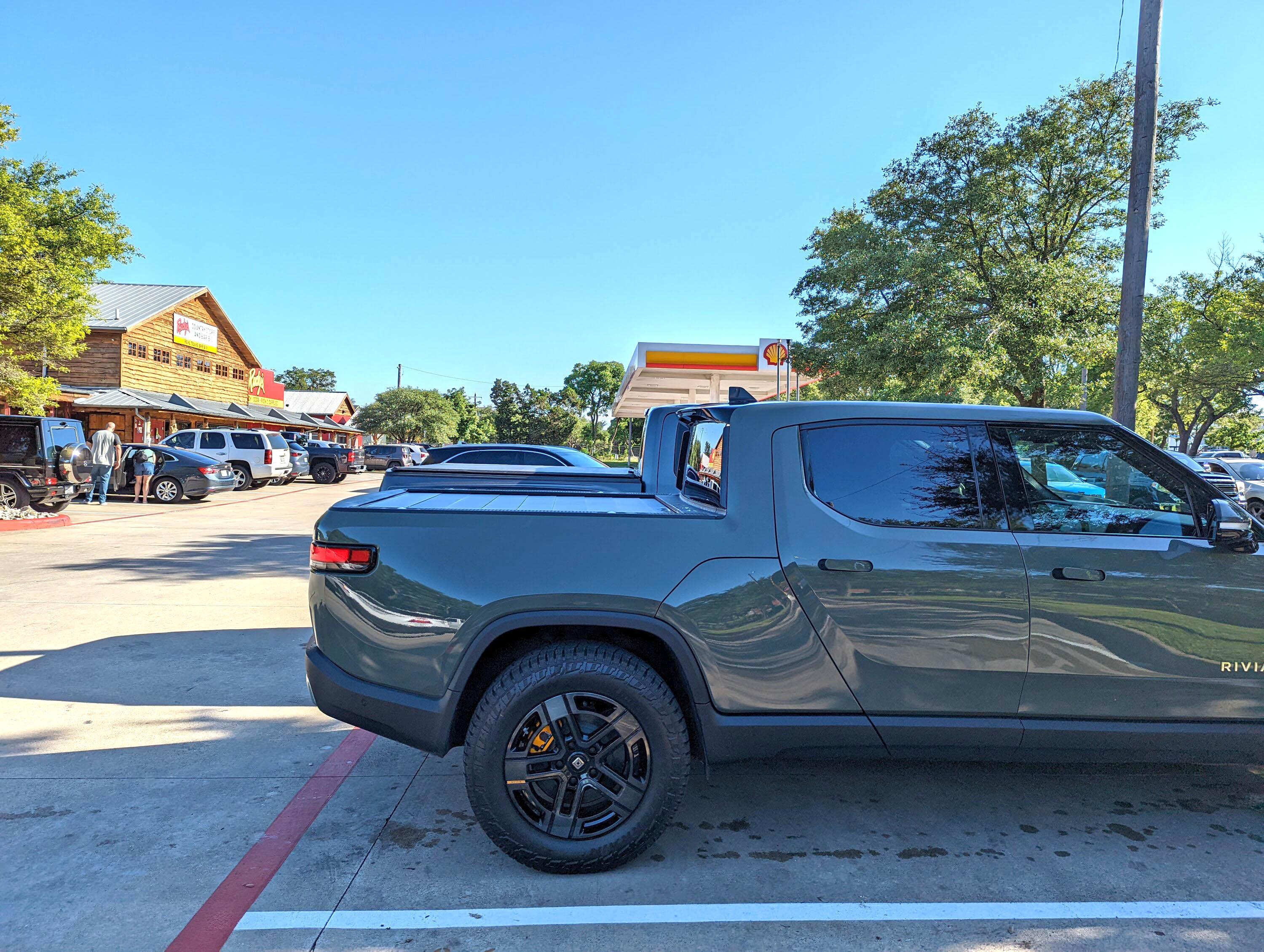 Rivian R1T R1S Rivian R1T vs. Ford Raptor comparison side by side PXL_20220604_230104051