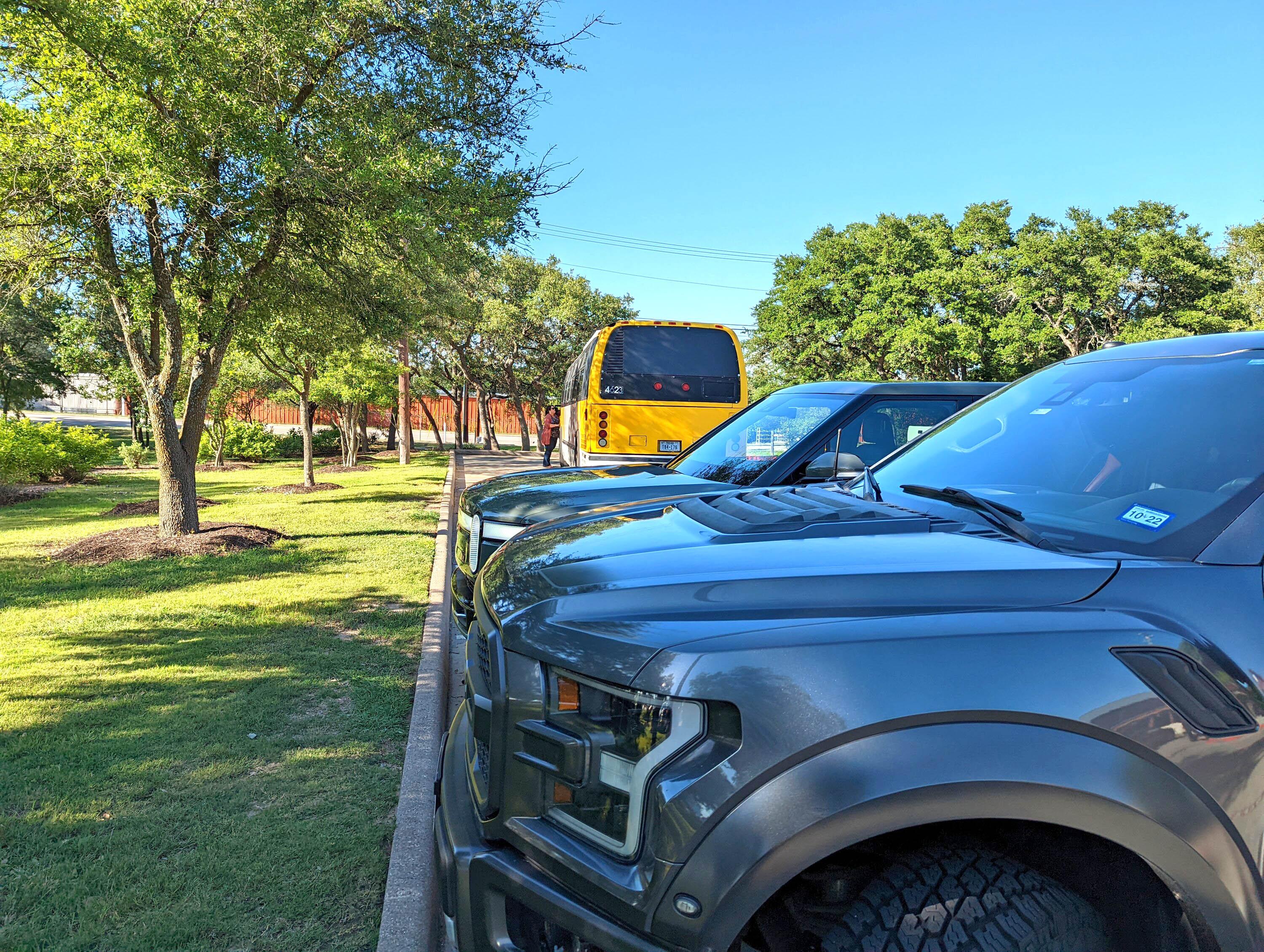 Rivian R1T R1S Rivian R1T vs. Ford Raptor comparison side by side PXL_20220604_230133014