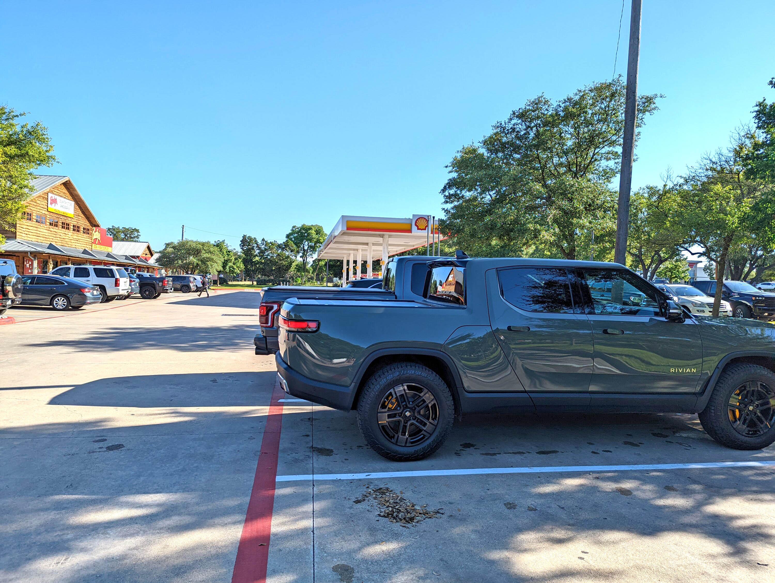 Rivian R1T R1S Rivian R1T vs. Ford Raptor comparison side by side PXL_20220604_230225408