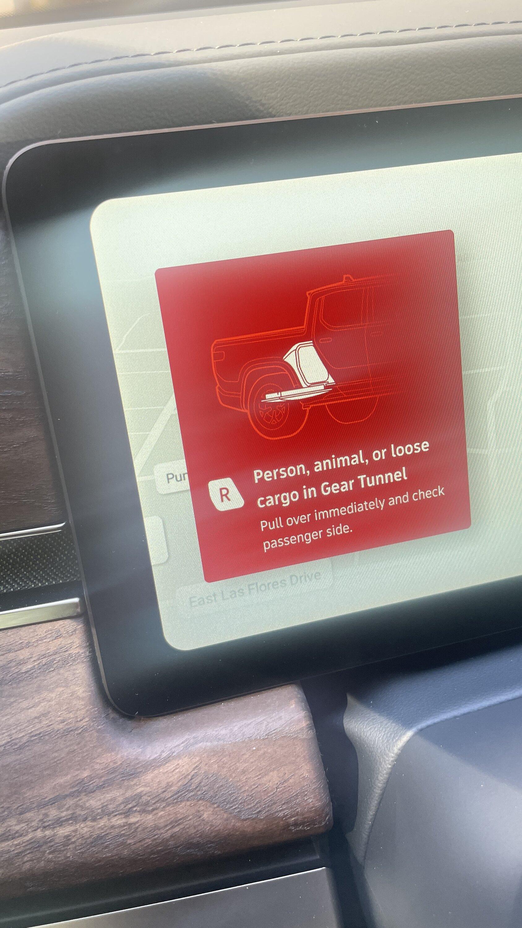 Rivian R1T R1S Error Message:  Person, Animal or Loose Cargo in Gear Tunnel IMG_7704.JPG