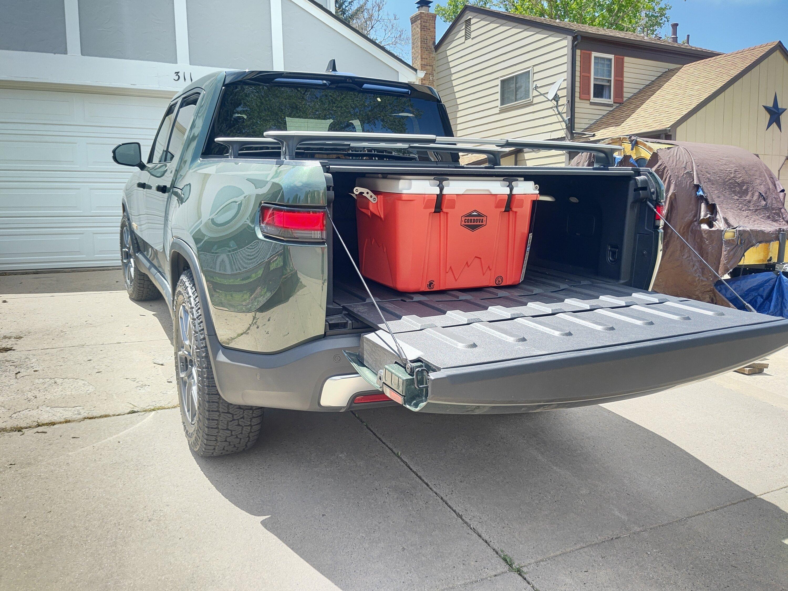 Coolers in bed - Yeti Roadie 24 fits under tonneau cover | Rivian Forum -  R1T R1S R2 R3 News, Specs, Models, RIVN Stock -- Rivianforums.com