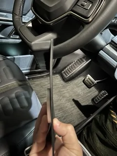 Rivian R1T R1S Here's a look at the wireless charger coils on the center console. IMG_6106 Small