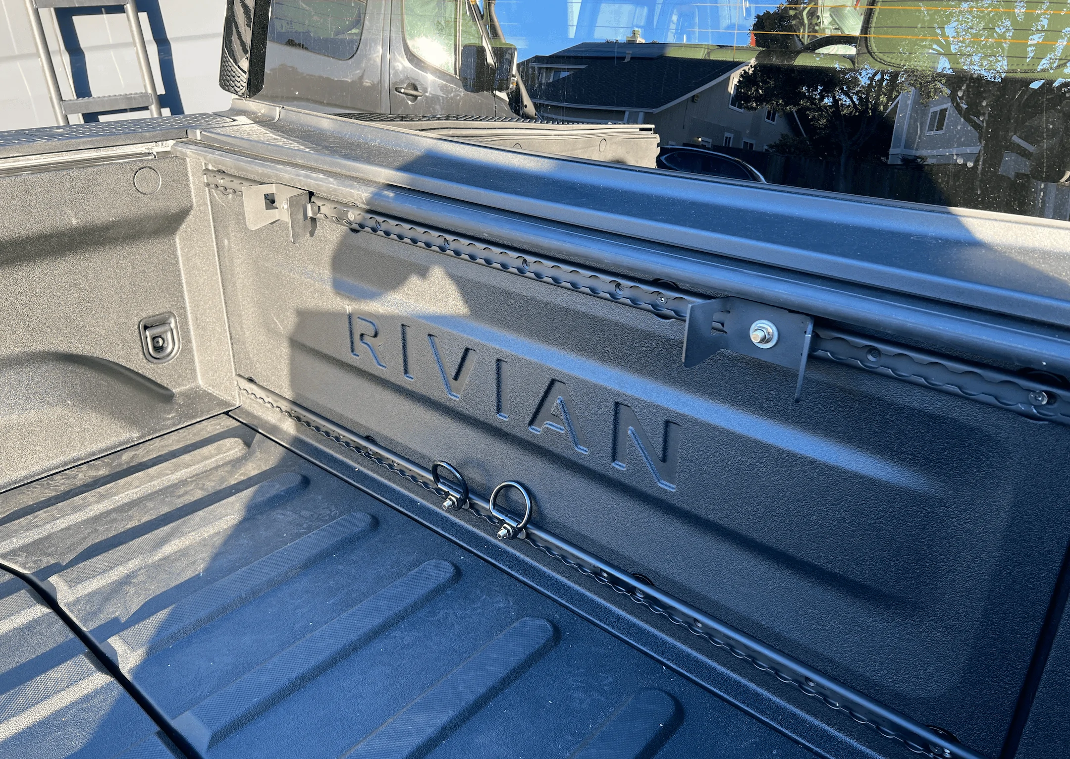 Rivian R1T R1S Rivian hauling dirt bikes in bed -- test fitting TE300 and 500 KTM 1656448721202