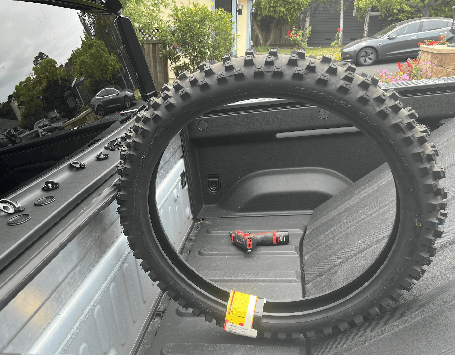 Rivian R1T R1S Rivian hauling dirt bikes in bed -- test fitting TE300 and 500 KTM 1656450037005