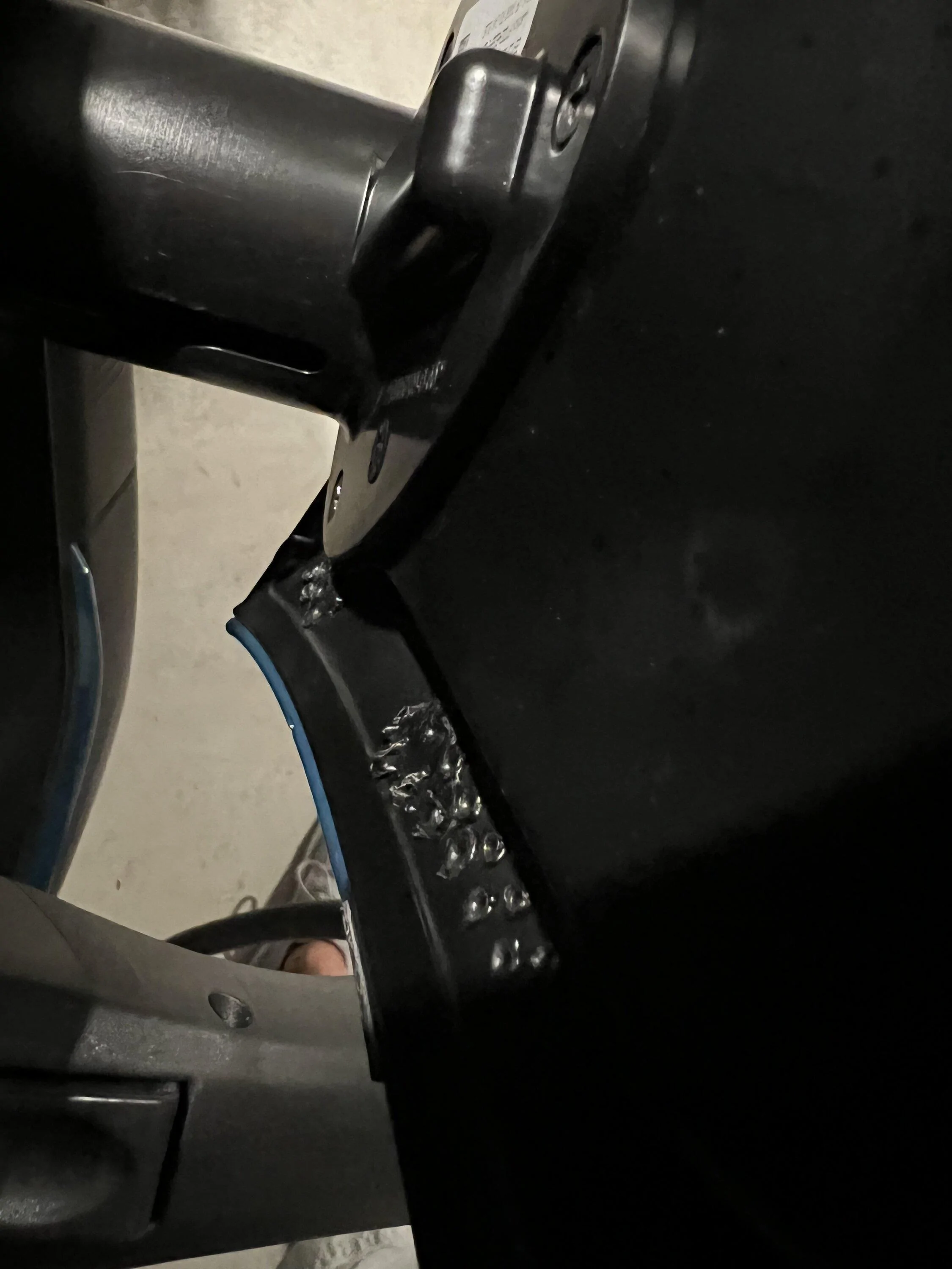 Rivian R1T R1S Odd plastic deformation in charge port door C23AA26D-3B70-4AB6-BE5B-AC4E06925BE3