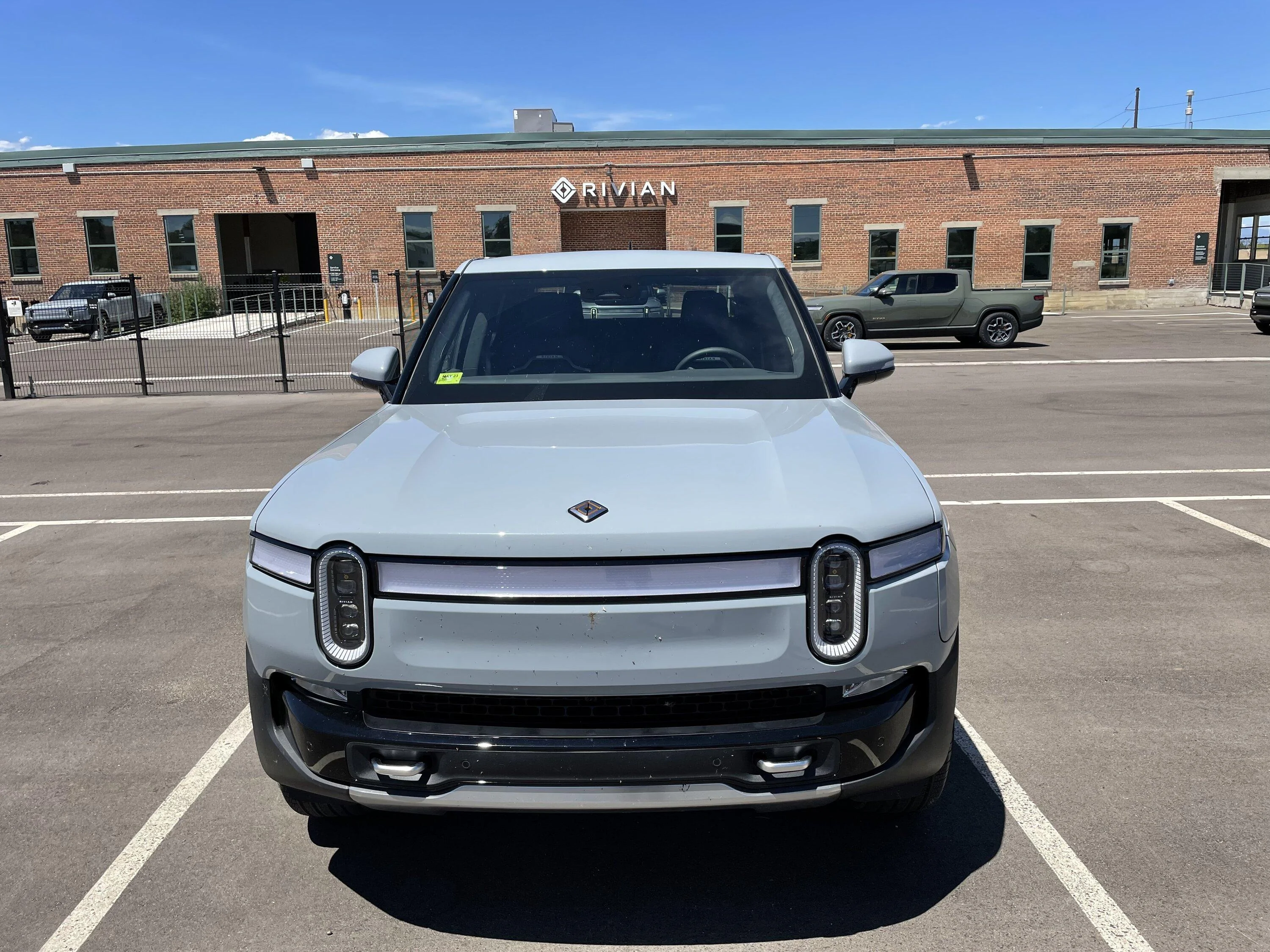 Rivian R1T R1S Limestone next to Subaru's light blue F47915B8-5DDC-4171-A7F3-DF5D7D418387