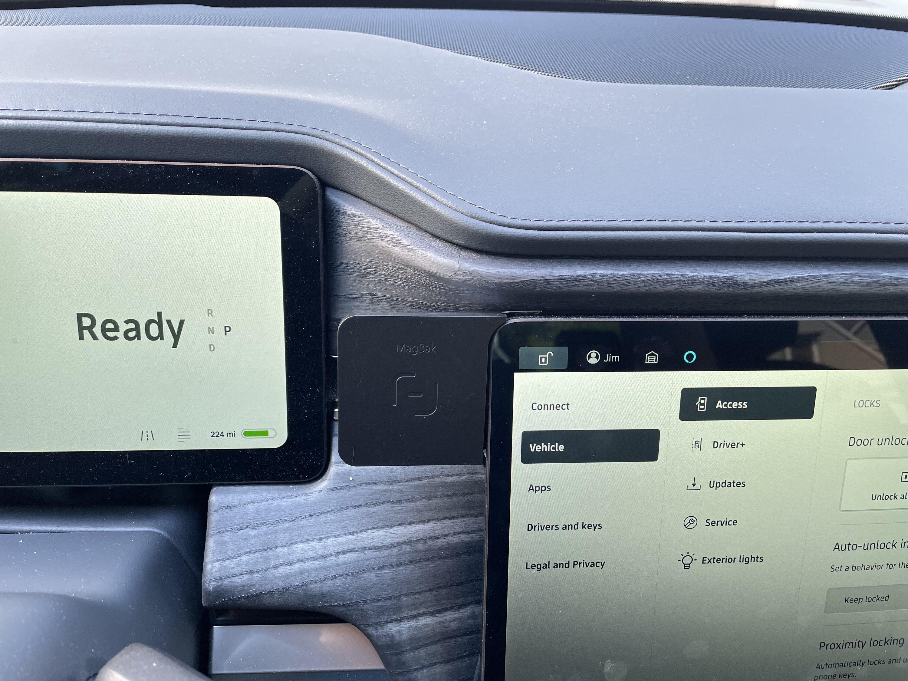 Rivian R1T R1S Wireless charging pad useless. Any changes imminent? Photo Jul 25, 10 23 55 AM