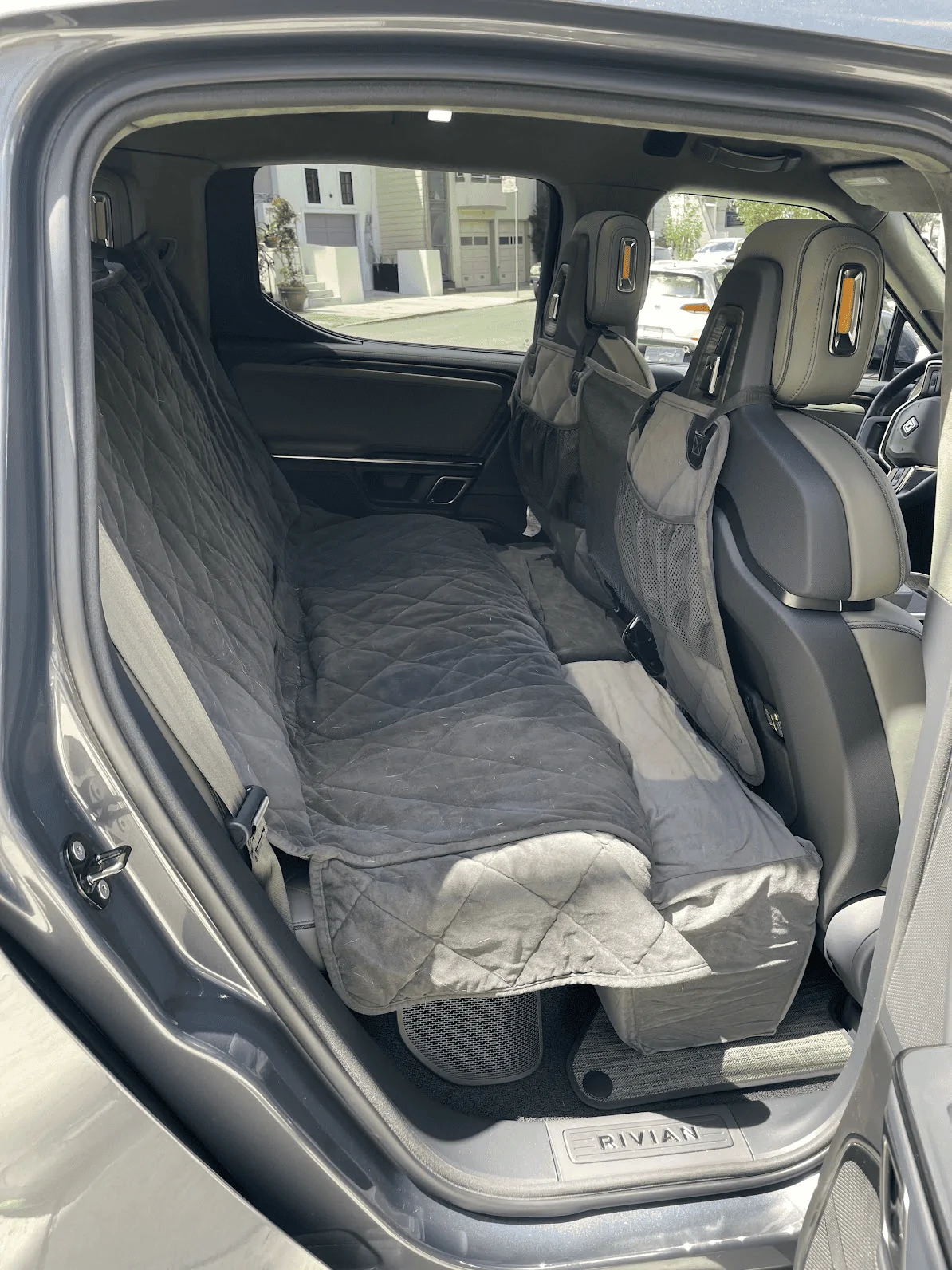 Rivian R1T R1S Thumbs (and paws) up for Orvis Seat Cover 1660428980072
