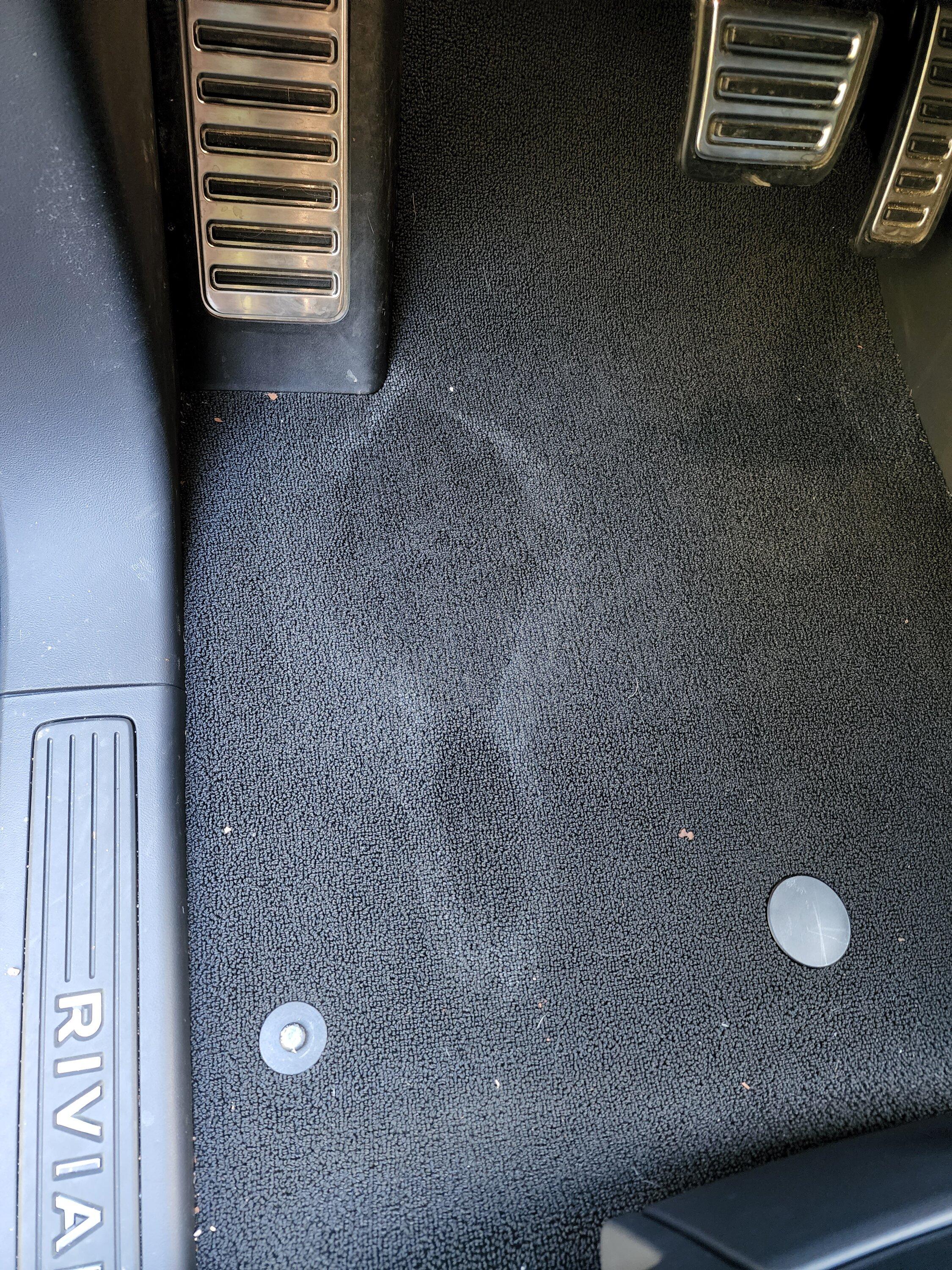 Rivian R1T R1S Wet spot under driver mat 20220817_182435