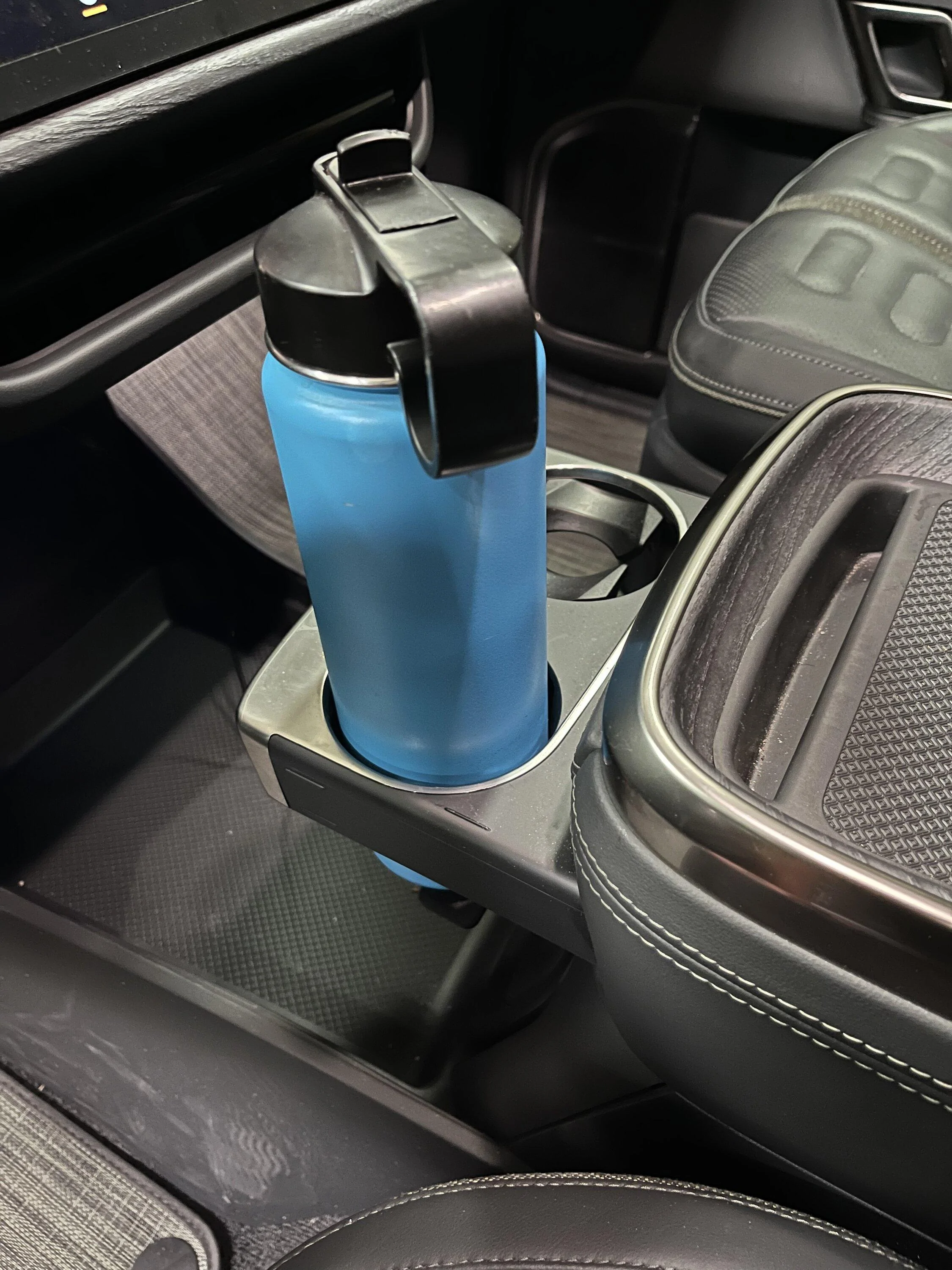 Rivian R1T R1S What reusable water bottle actually fits in the R1T/R1S? 3FB55C25-1481-4D28-8E1C-2EC1991BD9FB