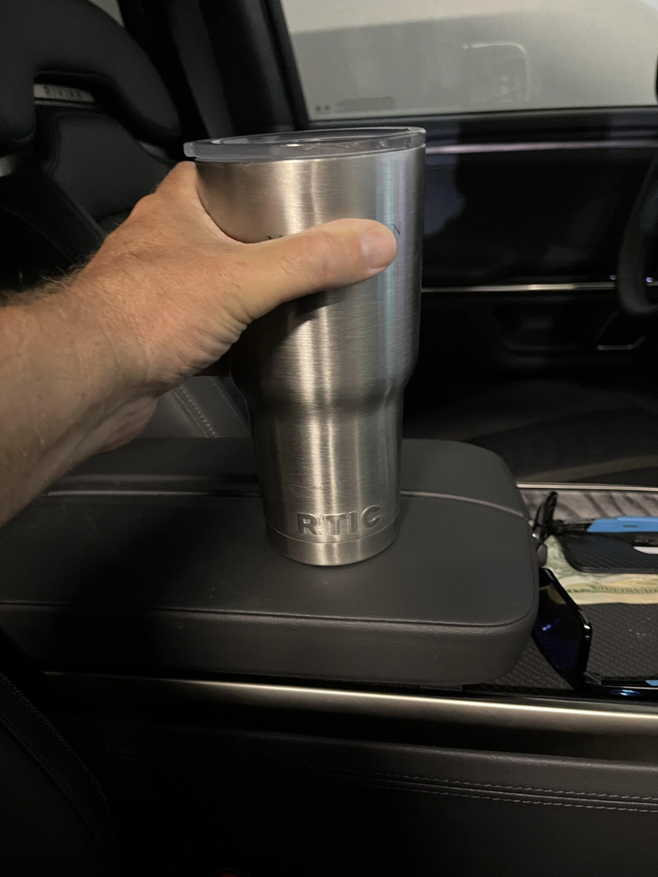 Rivian R1T R1S What reusable water bottle actually fits in the R1T/R1S? 03852F2C-EB89-4396-BD48-86FBB338A8C2