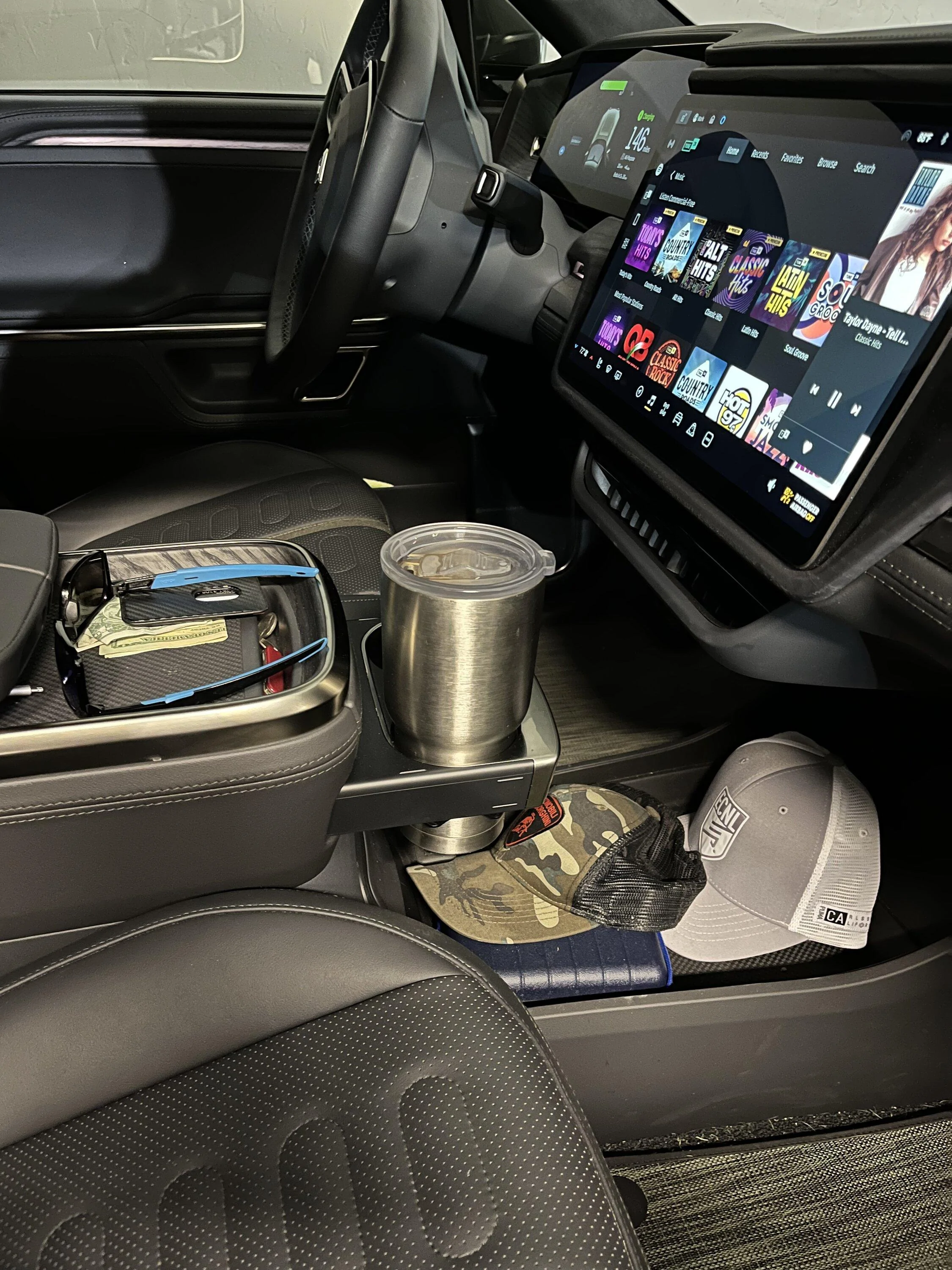 Rivian R1T R1S What reusable water bottle actually fits in the R1T/R1S? DBAD27E4-C2C8-4925-AEDC-7D006BE2A659
