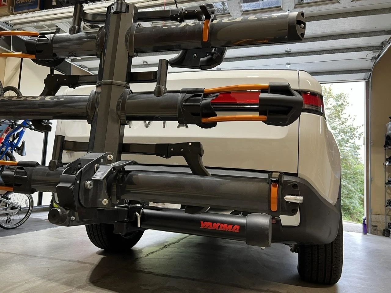 Rivian R1T R1S Installed Kuat NV 2.0 bike rack with Yakima BackSwing 345DED0D-285F-45D6-A05E-870364EE4D94