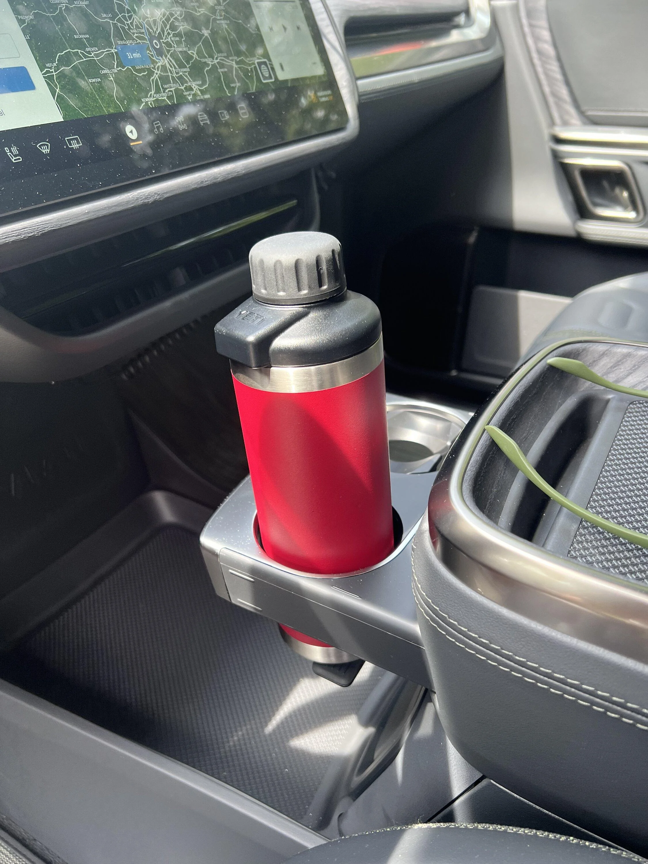 Rivian R1T R1S What reusable water bottle actually fits in the R1T/R1S? 330CB6C3-1F38-42B8-A45B-88F8F2F71159