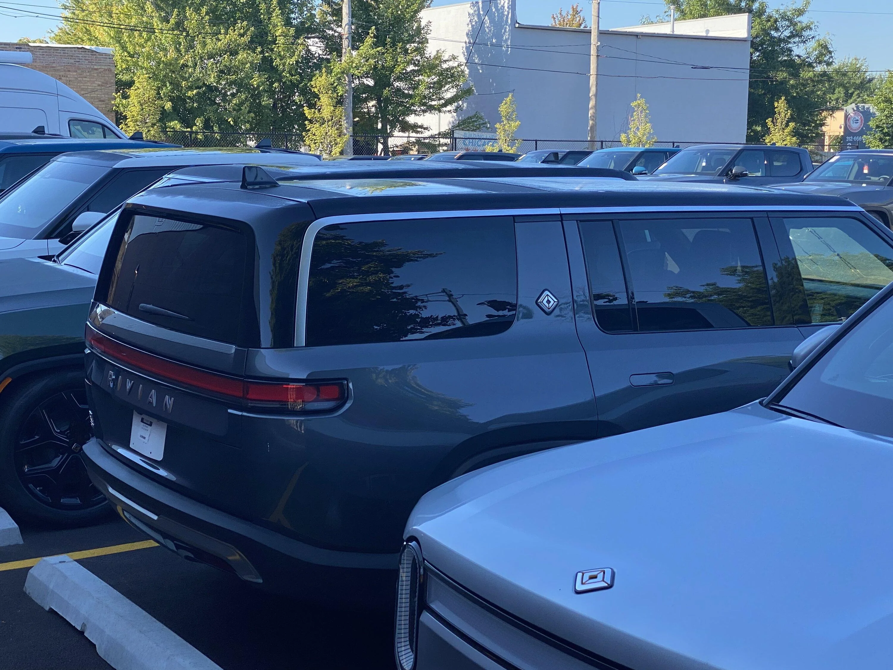 Rivian R1T R1S Four R1S spotted at Chicago Service Center CADBFF5B-AC70-485A-8AFF-8024D7AA3211
