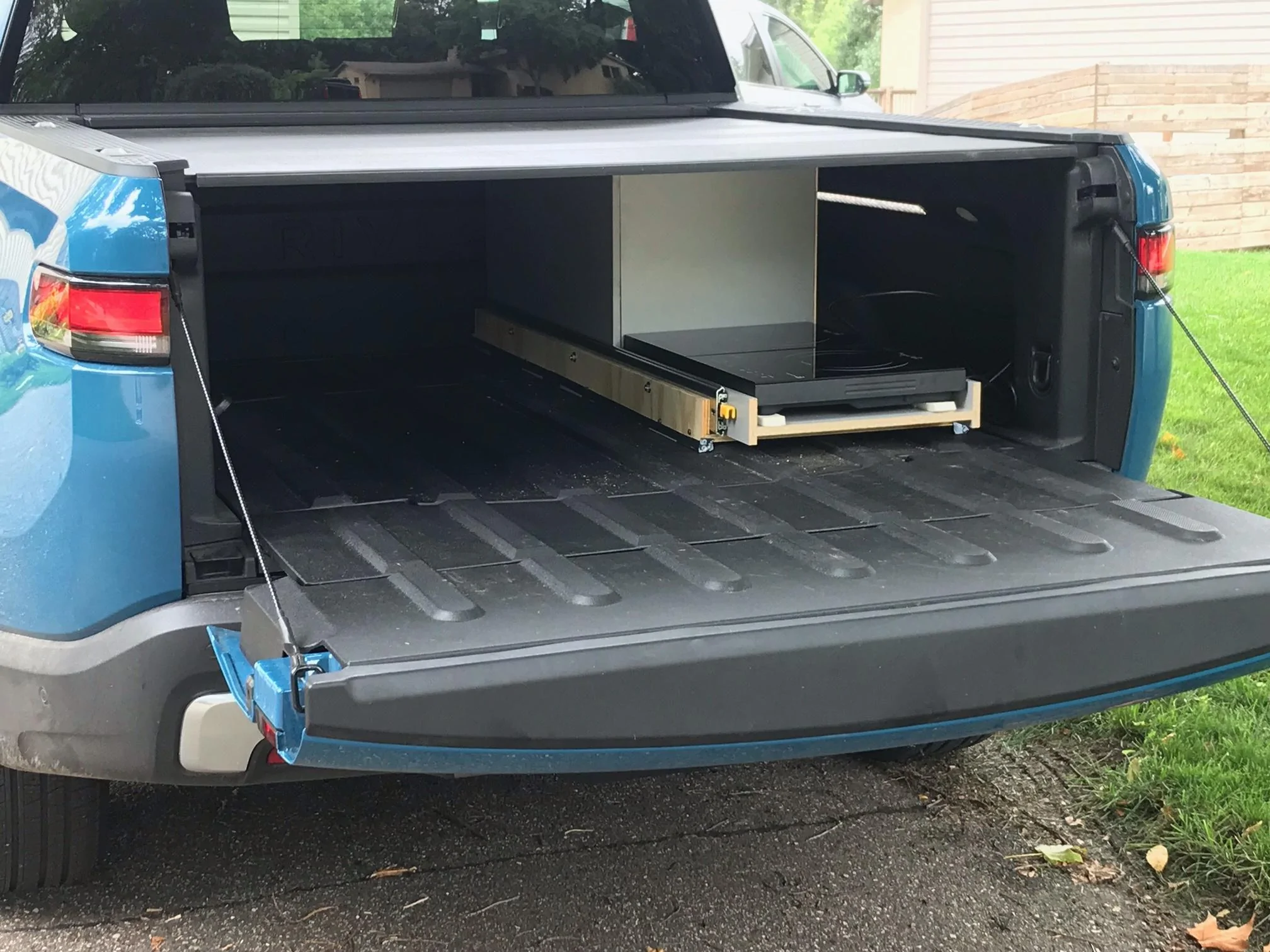 Rivian R1T R1S Our home made design for a slide out camp kitchen image0