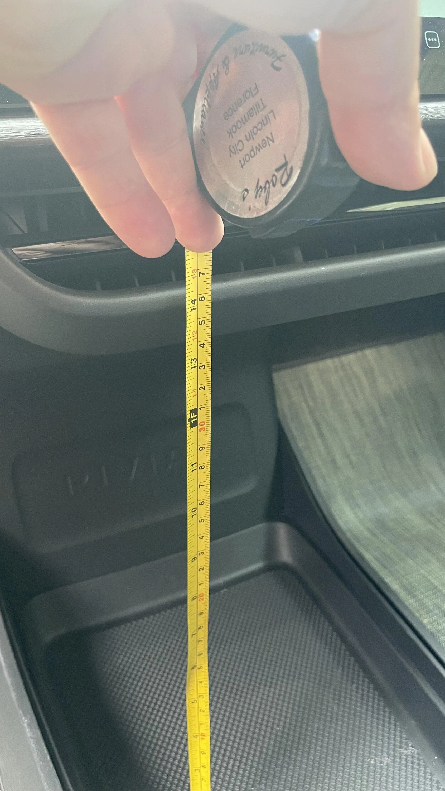 Rivian R1T R1S Dimensions of the floor tray for a cooler? 330E1217-7286-4AA8-B544-04E46F516888
