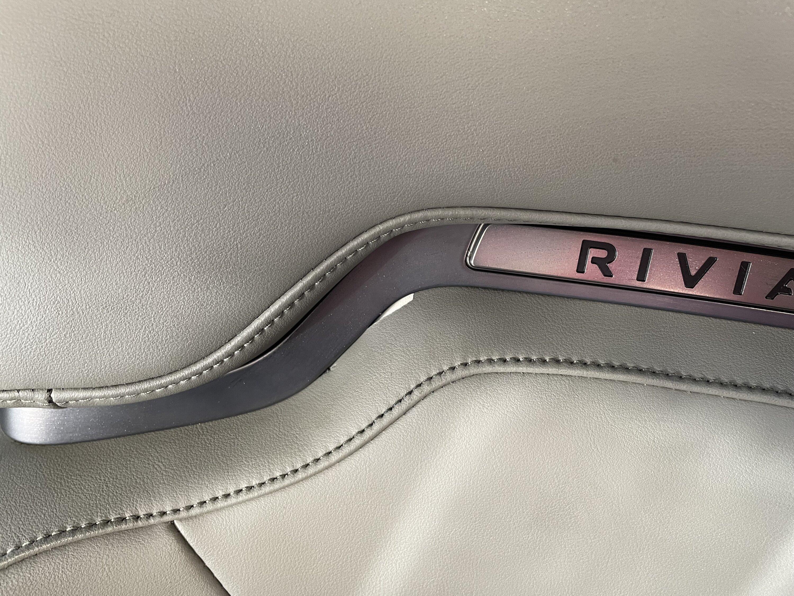 Rivian R1T R1S Driver's seat vinyl pulling out from divider, anybody else? IMG_0448