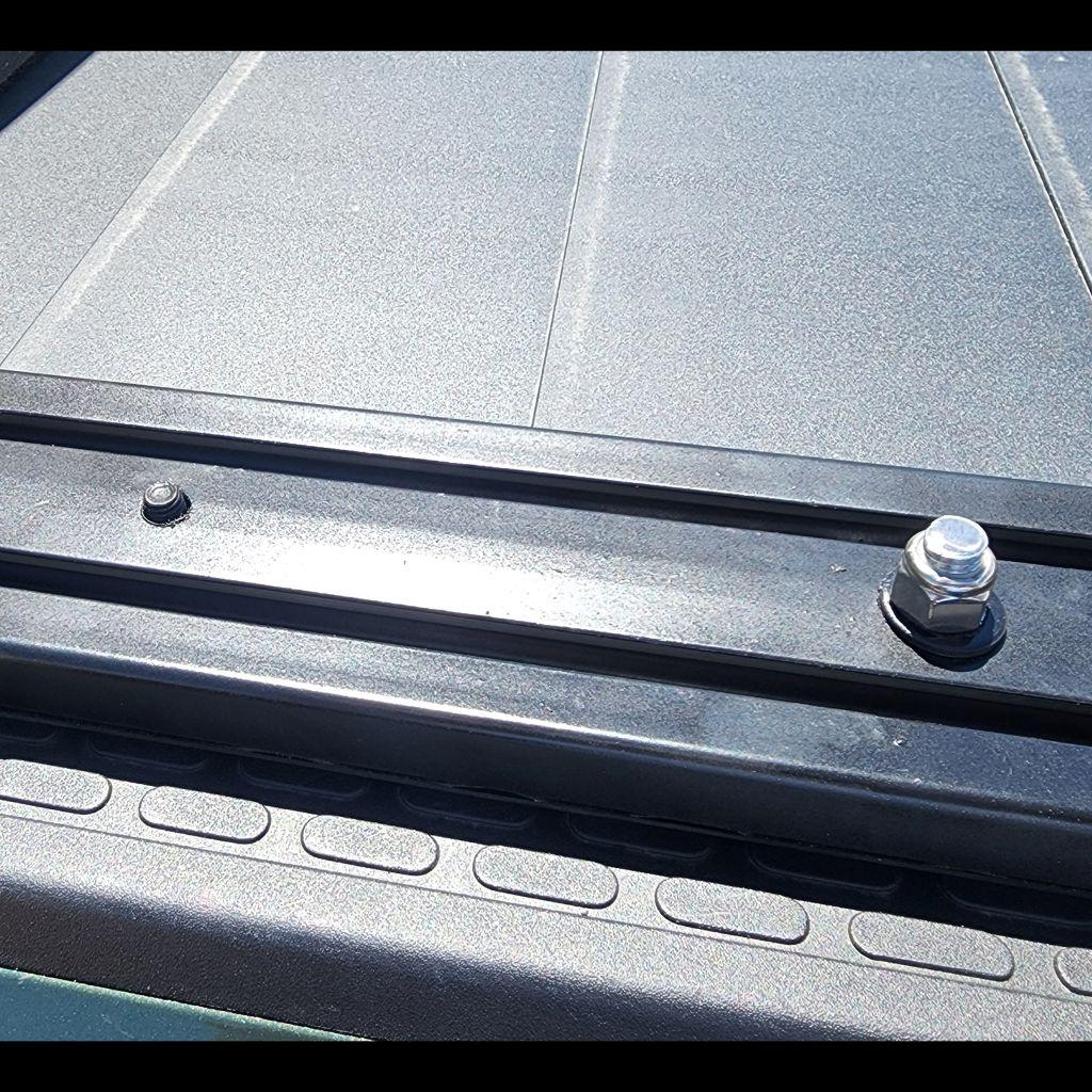 Rivian R1T R1S Hairbrained Idea - T-track Mount for Bed Rack 2022-07-04 gear tunnel button _112131